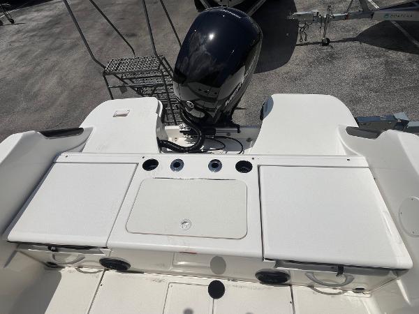 2022 Bayliner Trophy T22CC boat with outboard motor and spacious deck layout.