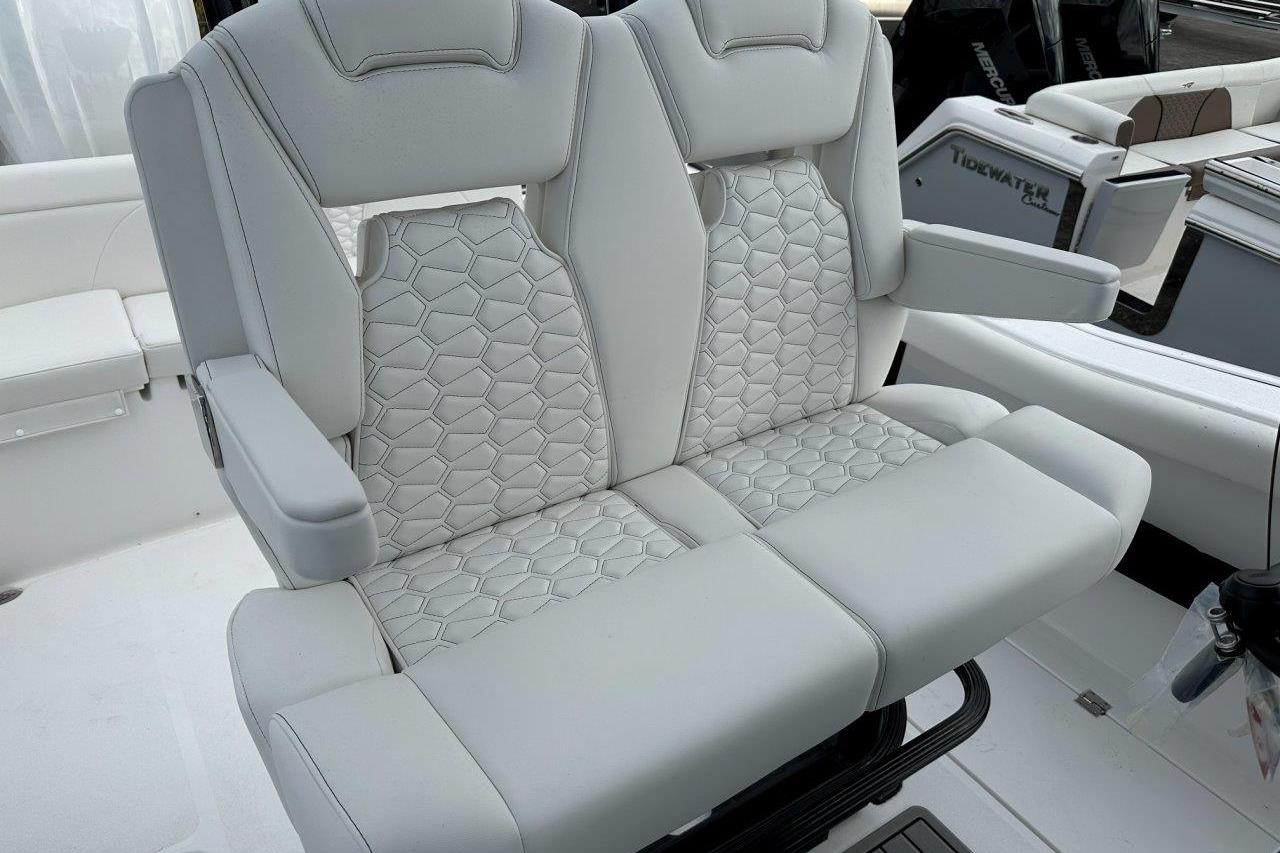 2026 Tidewater 272 LXF boat with luxurious dual captain's seats and stylish upholstery.