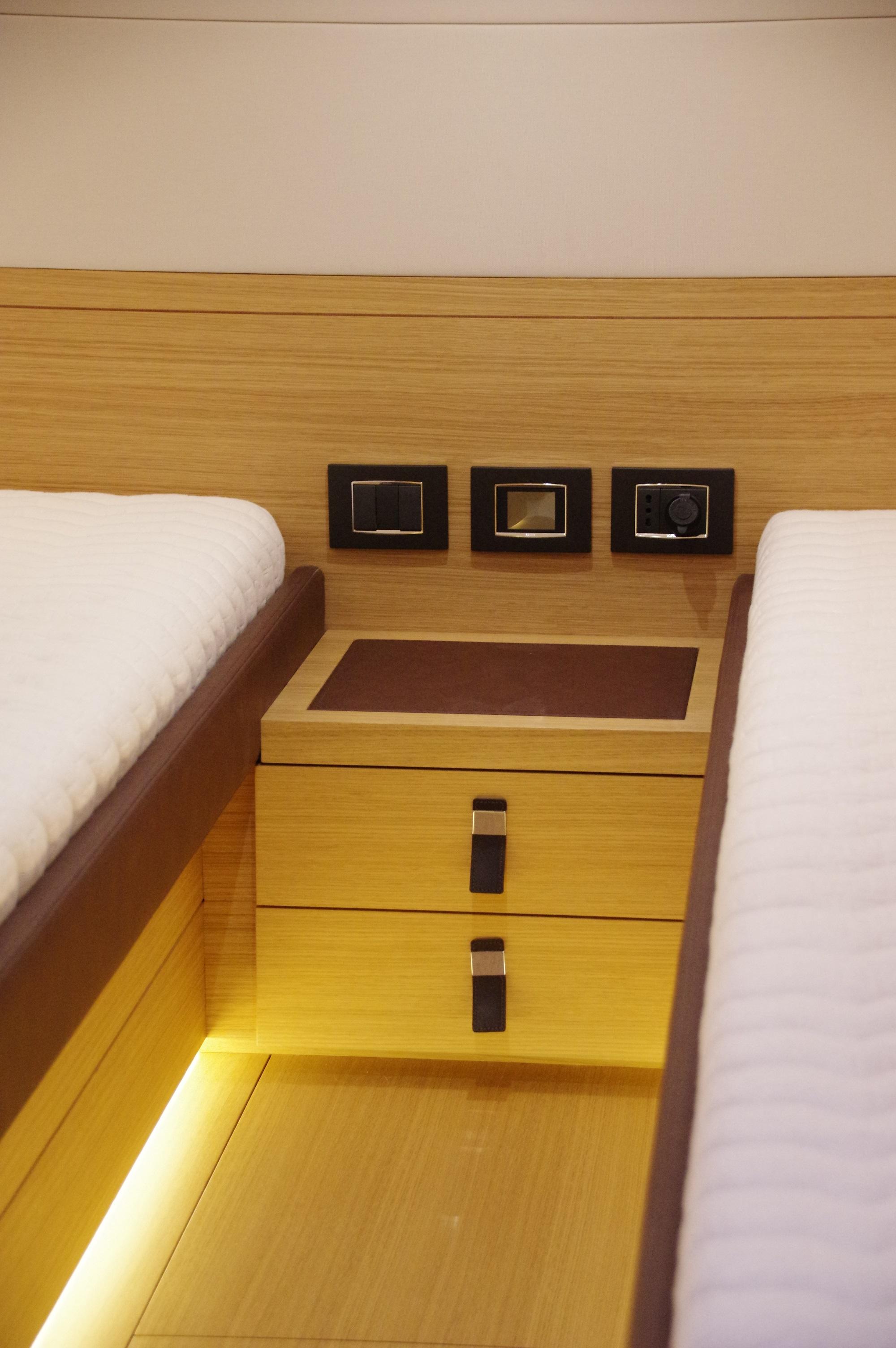 Luxurious interior of 2025 Pardo Yachts 50, featuring modern wood finishes and ambient lighting.