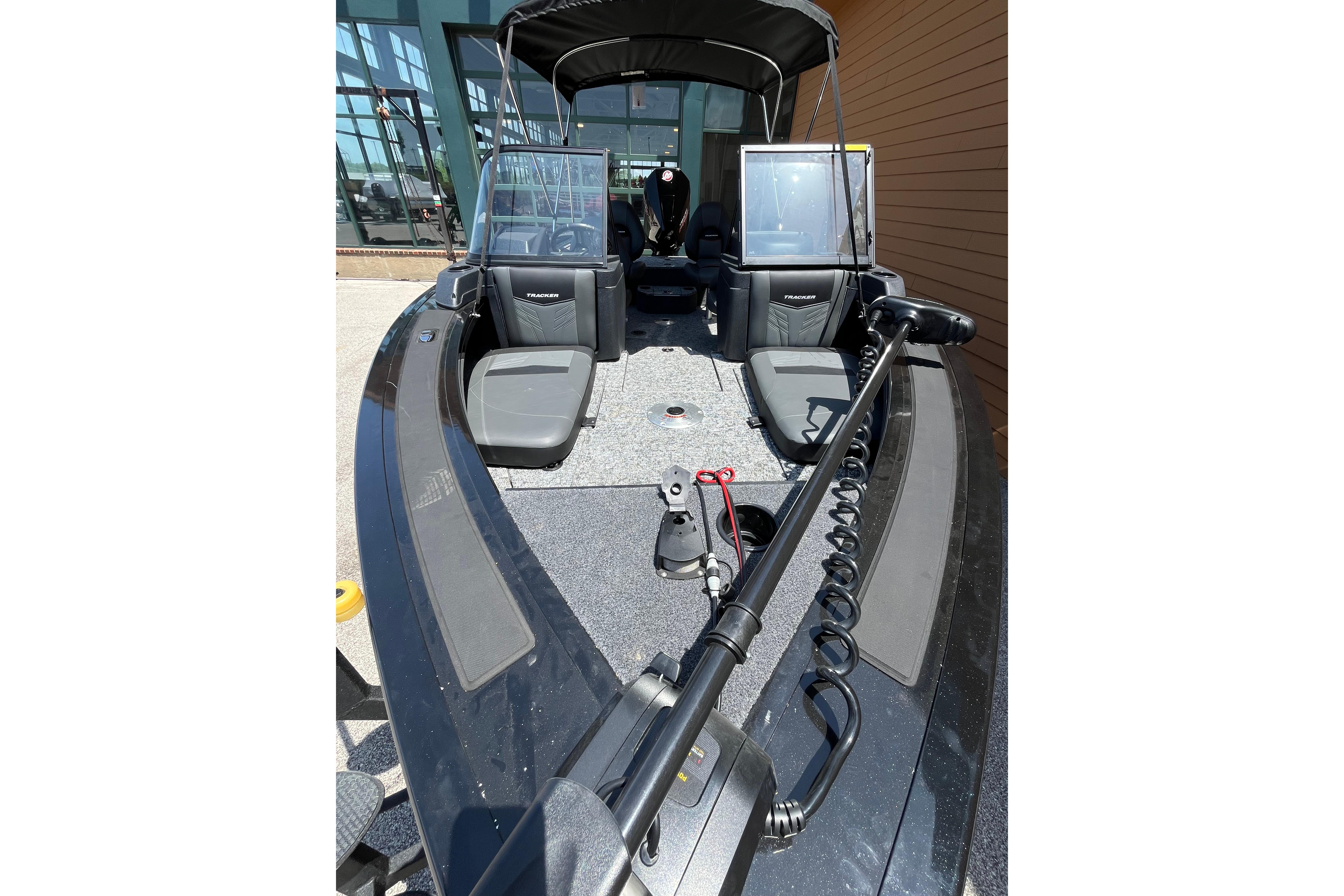 2026 Tracker Targa V-19 Combo boat interior with seating and equipment, displayed outdoors.