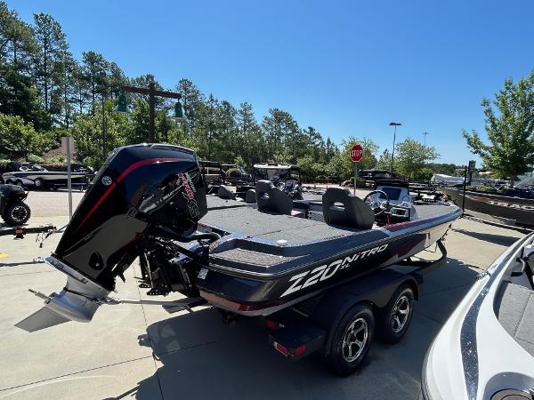 2025 Nitro Z20 XL Pro boat on trailer, parked outdoors, sunny day.