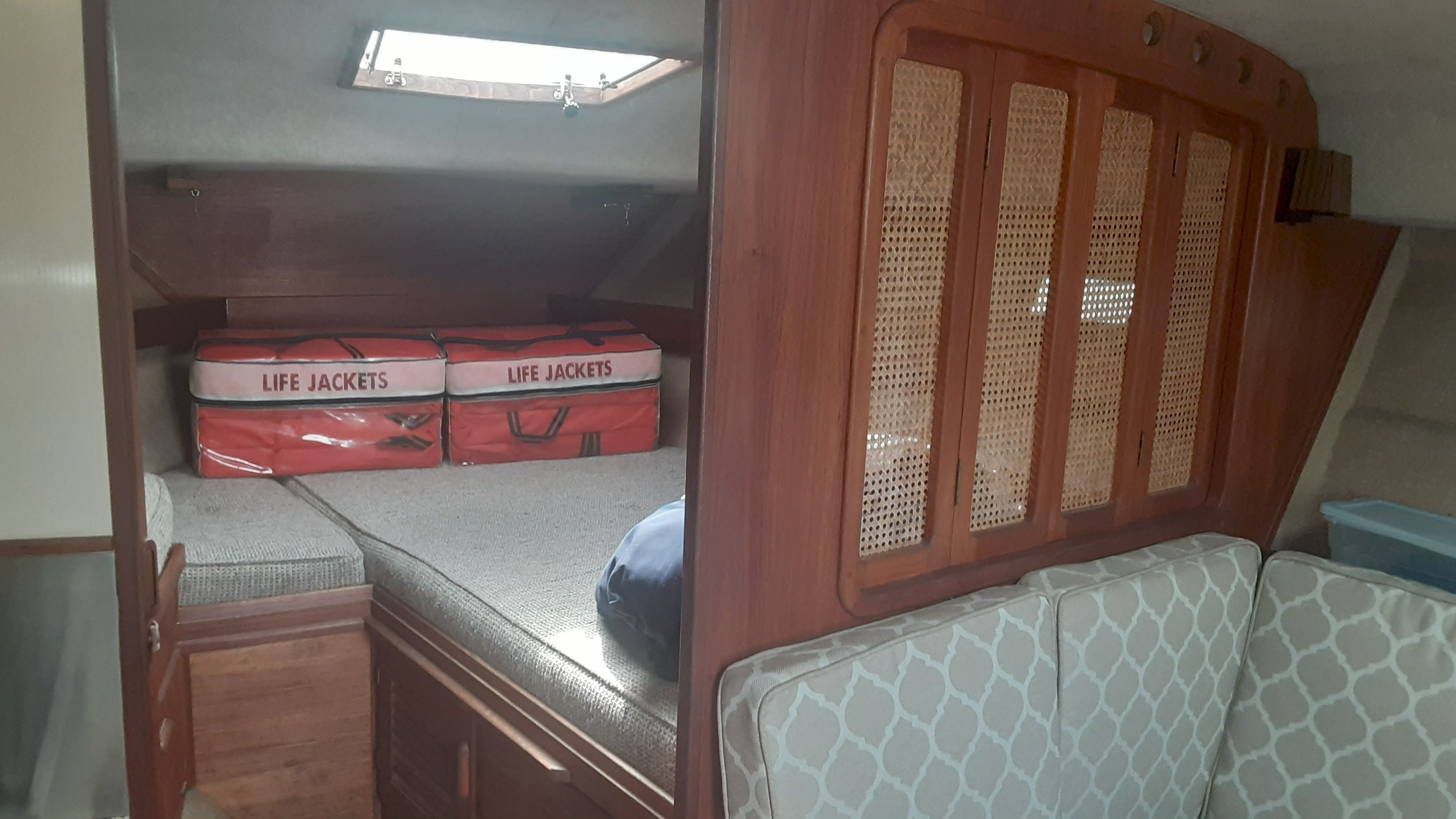 Interior of a 1985 Tiara Yachts 3100 Open with life jackets.