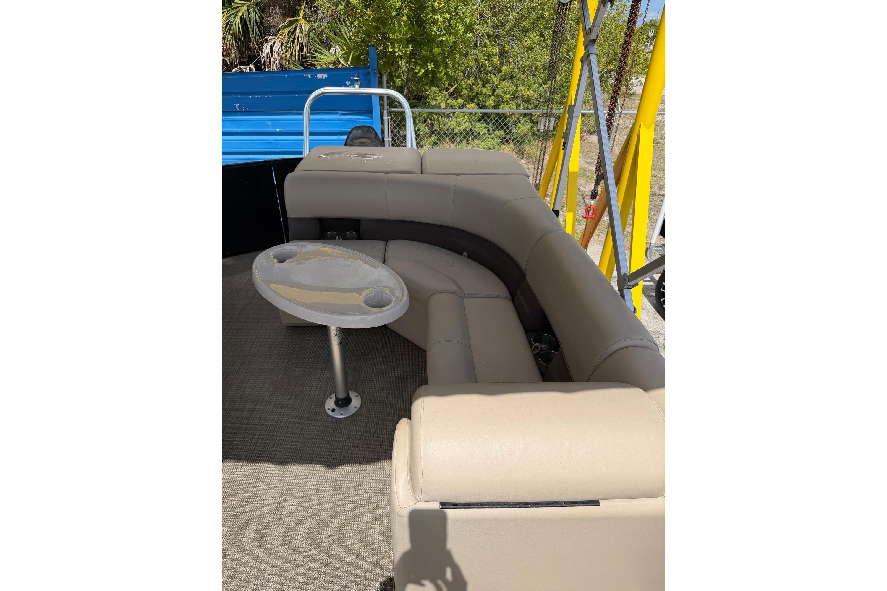 2022 Bentley Pontoons 240 CRUISE interior with beige seating and table.