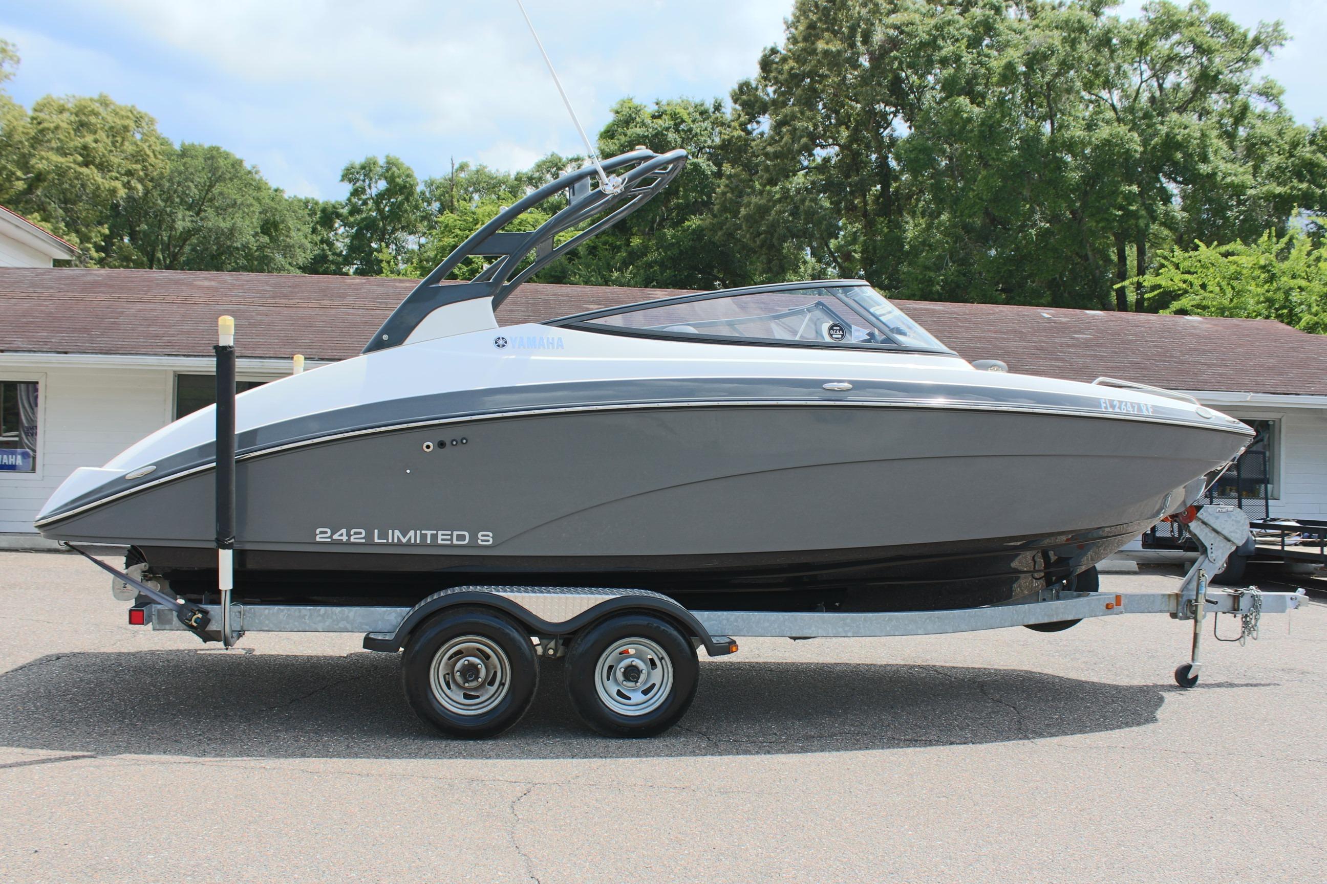 2016 Yamaha Boats 242 Limited S on trailer, parked outdoors.