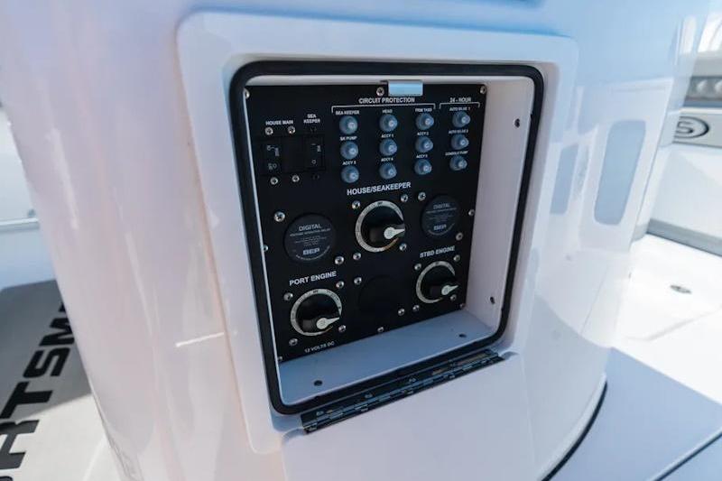 Control panel of 2026 Sportsman Open 282 Center Console boat, featuring circuit protection switches.
