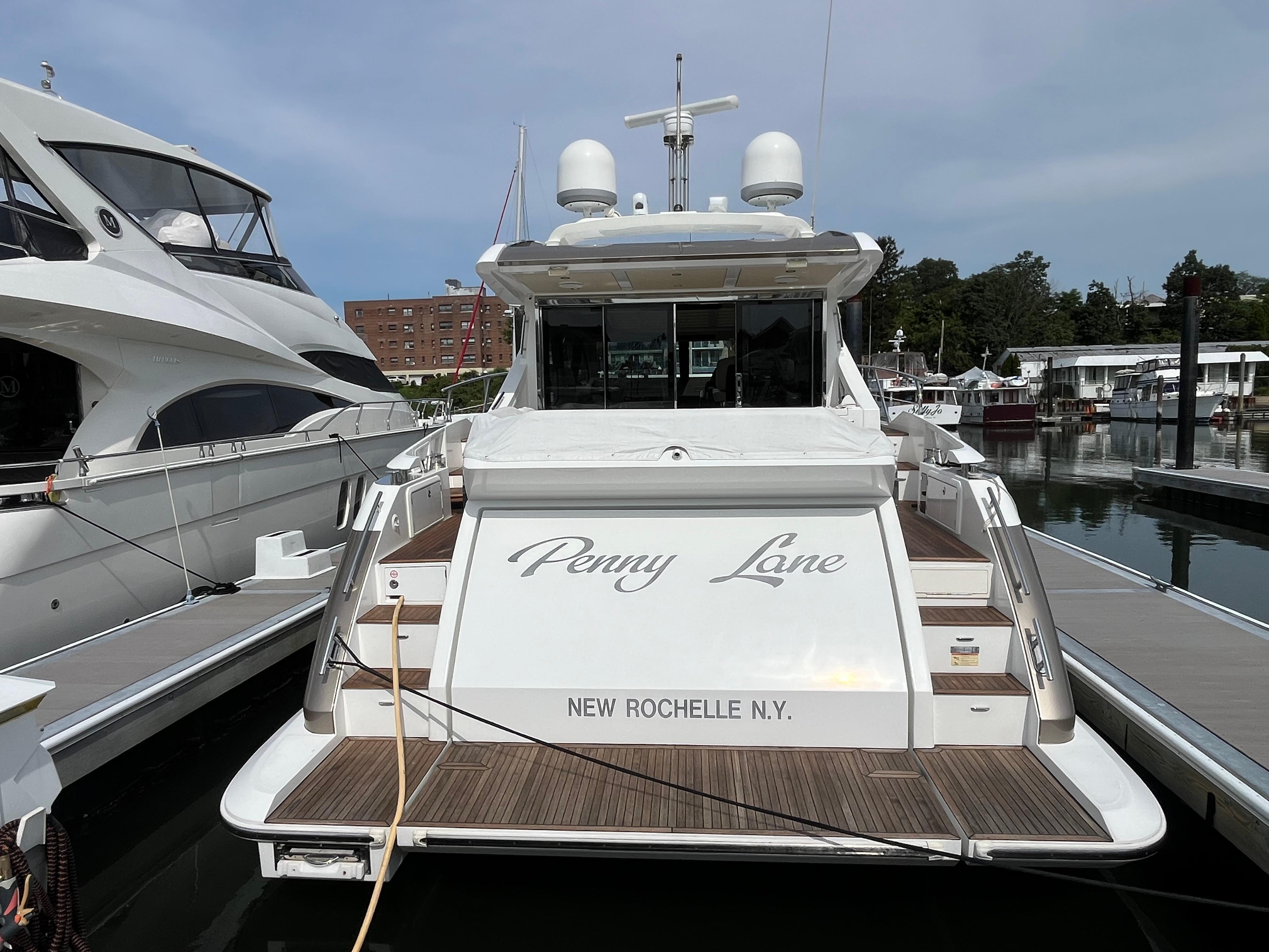 Azimut 55S 2014 yacht docked, named "Penny Lane," in New Rochelle, NY marina.