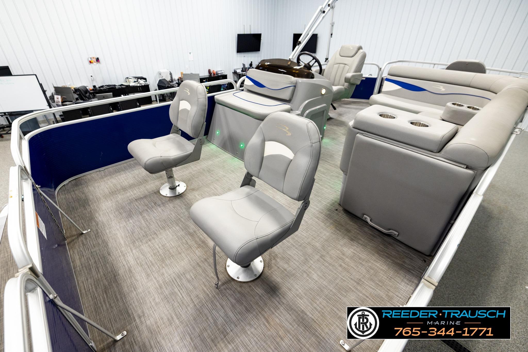 2021 Bennington 20 SV pontoon boat interior with gray seating and modern design.