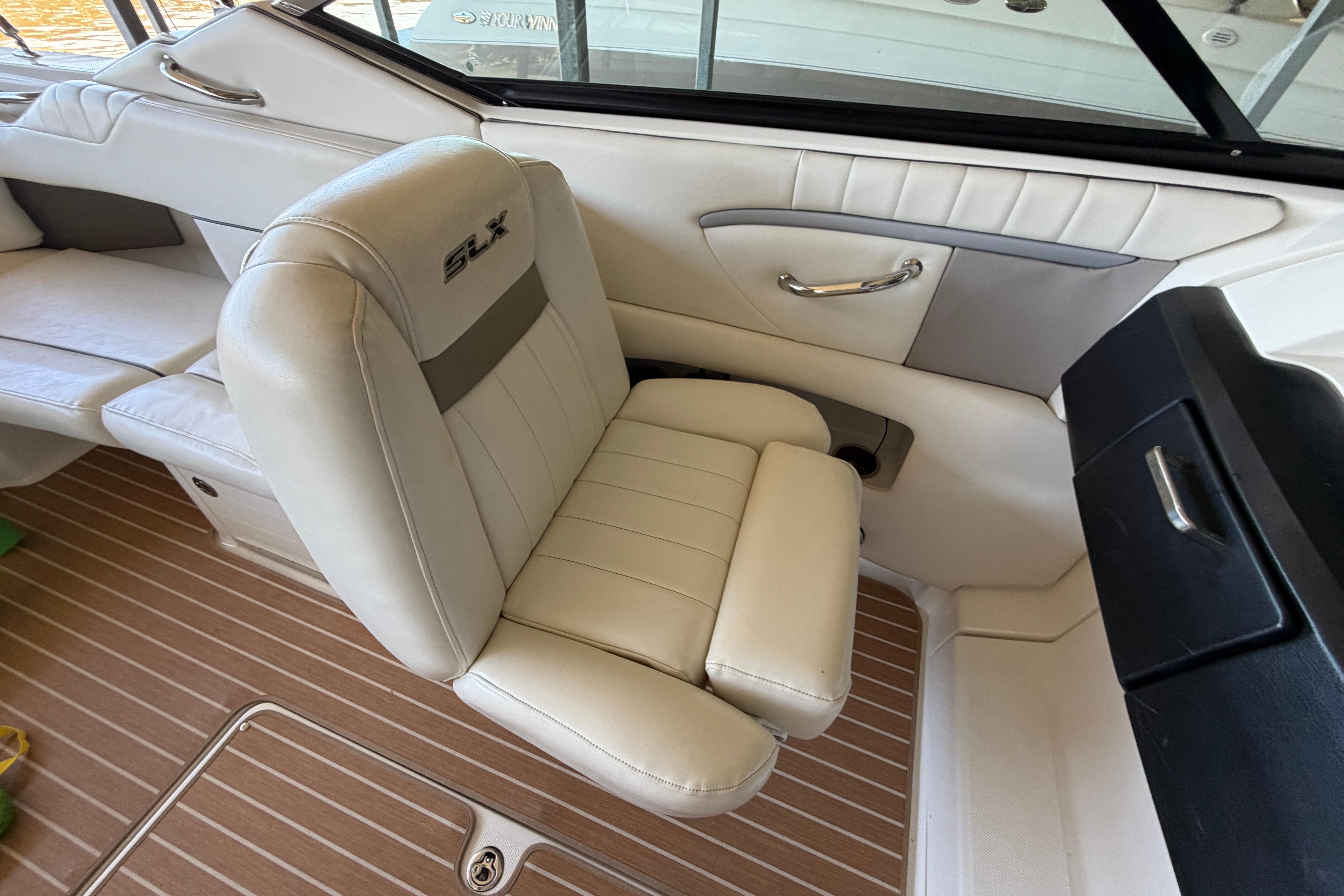 Interior of a 2007 Sea Ray 270 SLX boat featuring luxurious seating and sleek design.