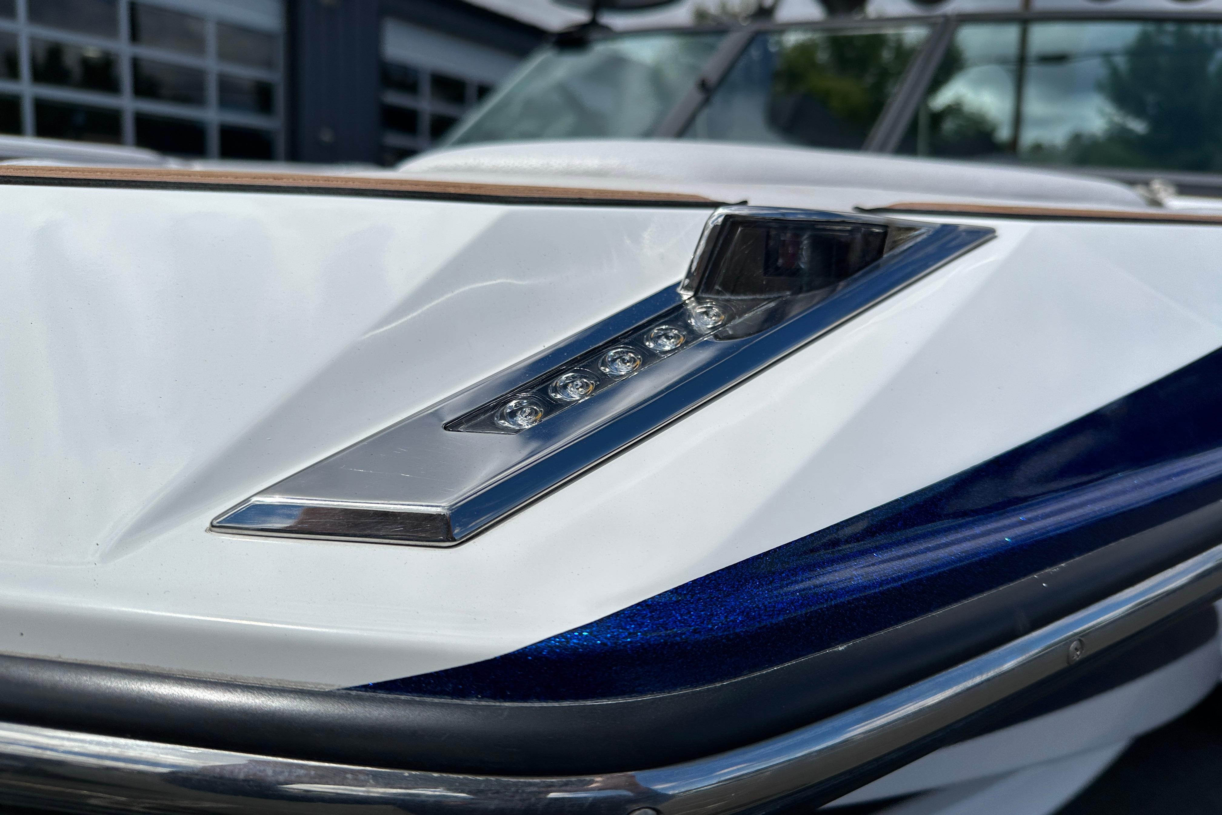 Close-up of 2017 Nautique Super Air Nautique GS20 boat's sleek LED light detail.