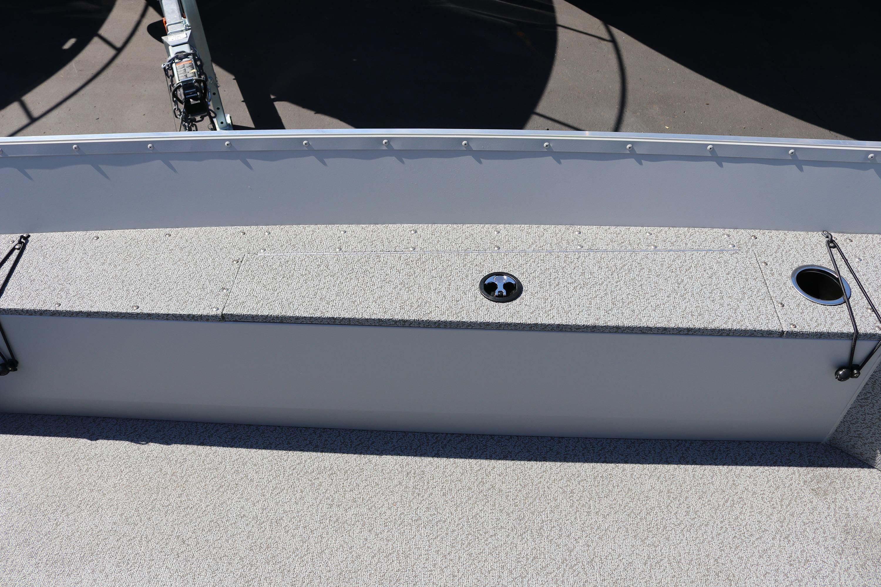 2025 Smoker Craft Angler 16 XL TL boat interior with storage compartment and cup holder.