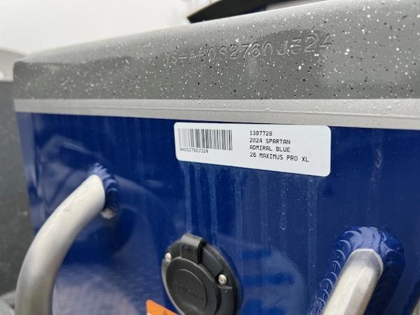 2024 Spartan 26 Maximus Pro XL in blue with visible label and serial number.