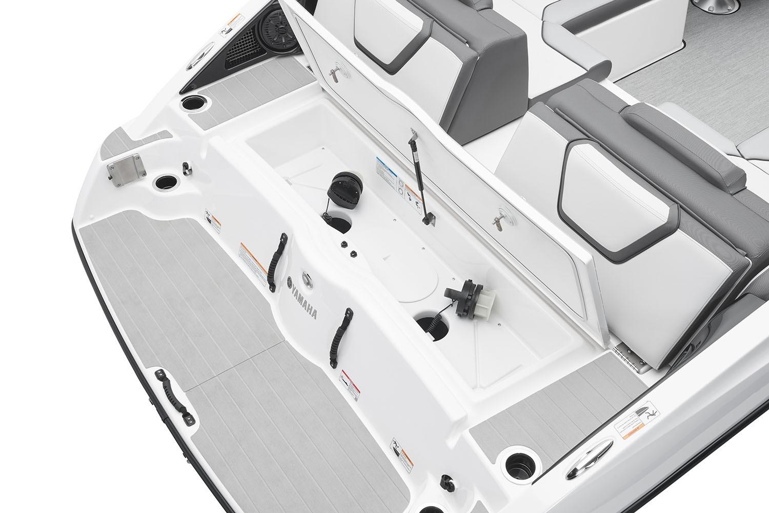 Manufacturer Provided Image: 2026 Yamaha Boats AR250 interior, featuring sleek seating and storage compartments.