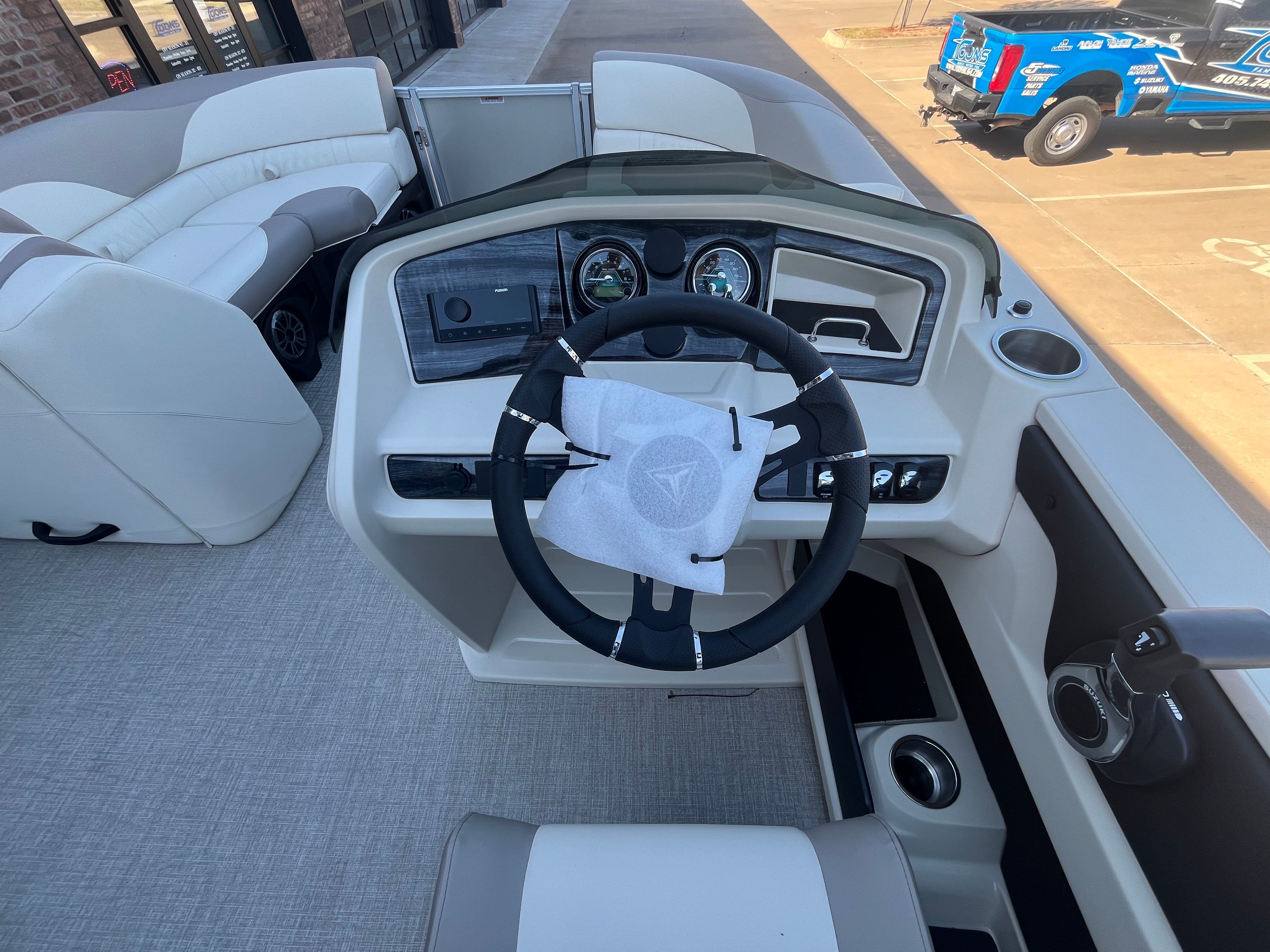 Interior view of 2026 Tahoe 2385 LTZ Quad Lounger boat.