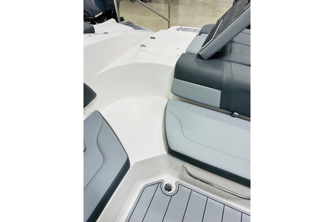 2025 Chaparral 23 SSi OB boat interior with sleek seating and modern design.