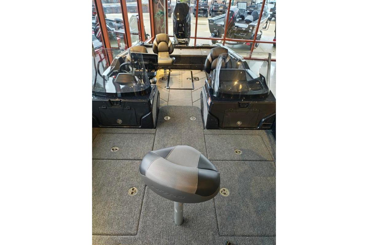 Interior view of 2026 Nitro ZV21 boat, featuring seating and dashboard.