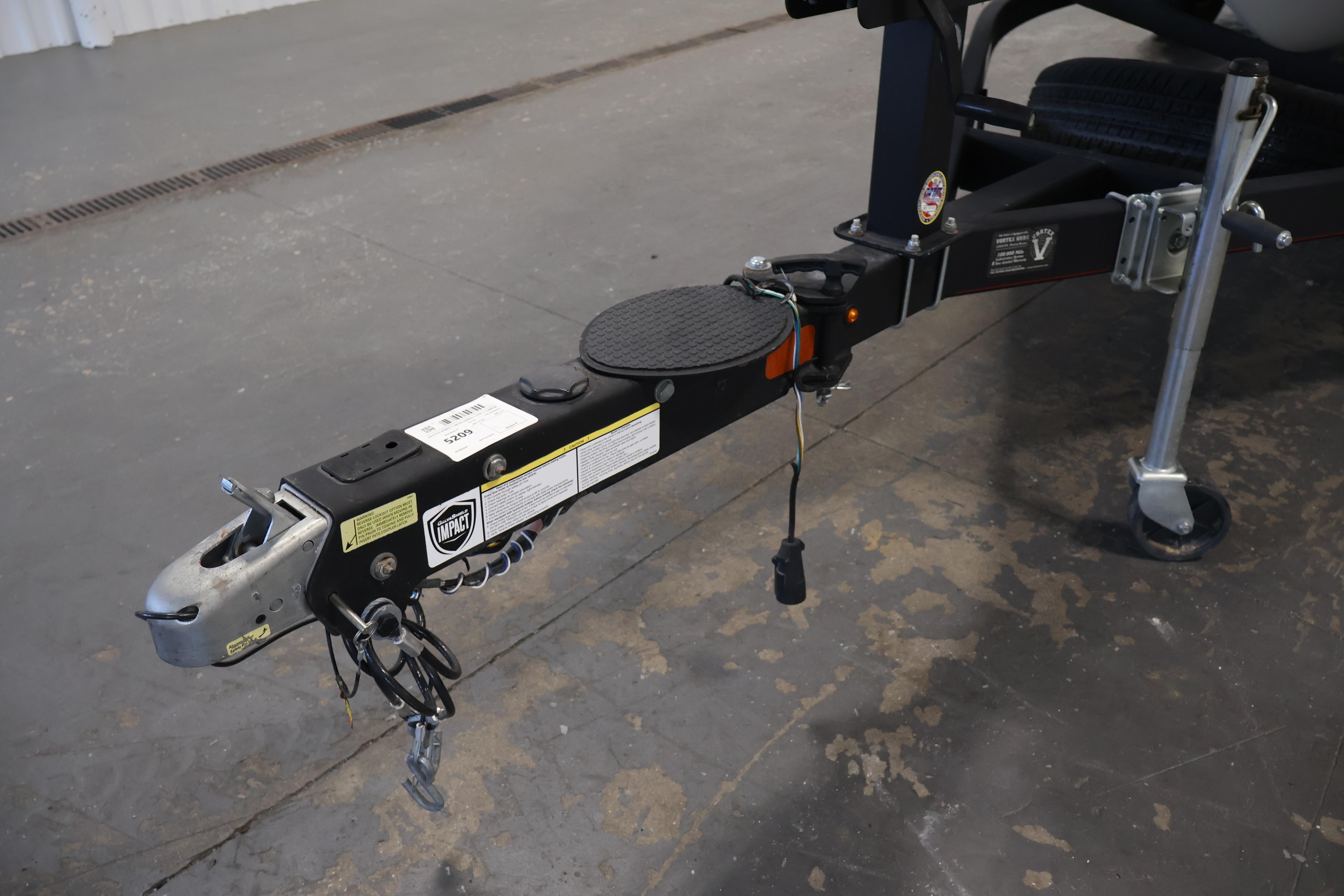 Trailer hitch of a 2019 Nitro Z19 Sport boat on a concrete floor.