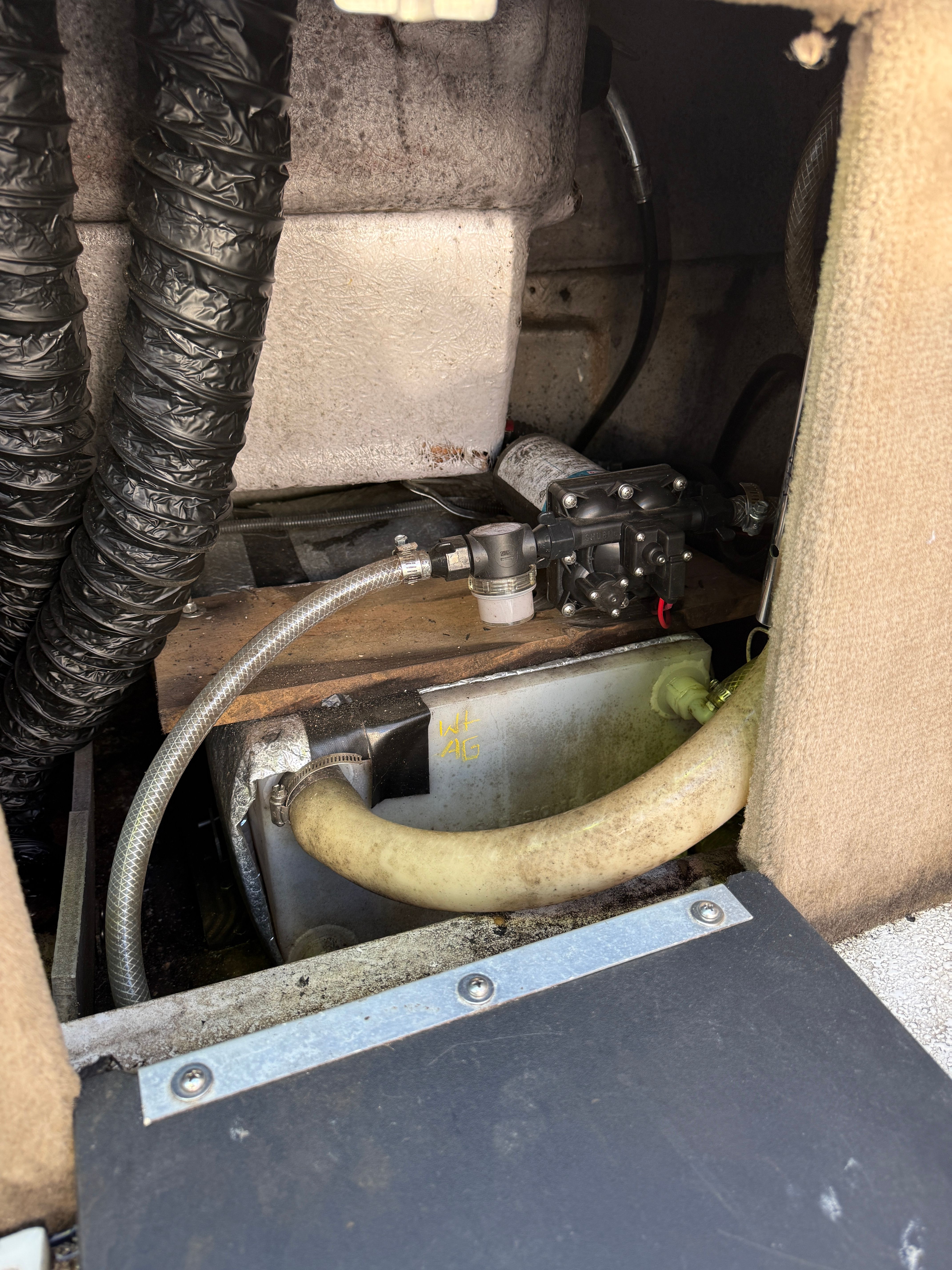 Interior view of a 1999 Custom 2335 Cuddy cabin boat.
