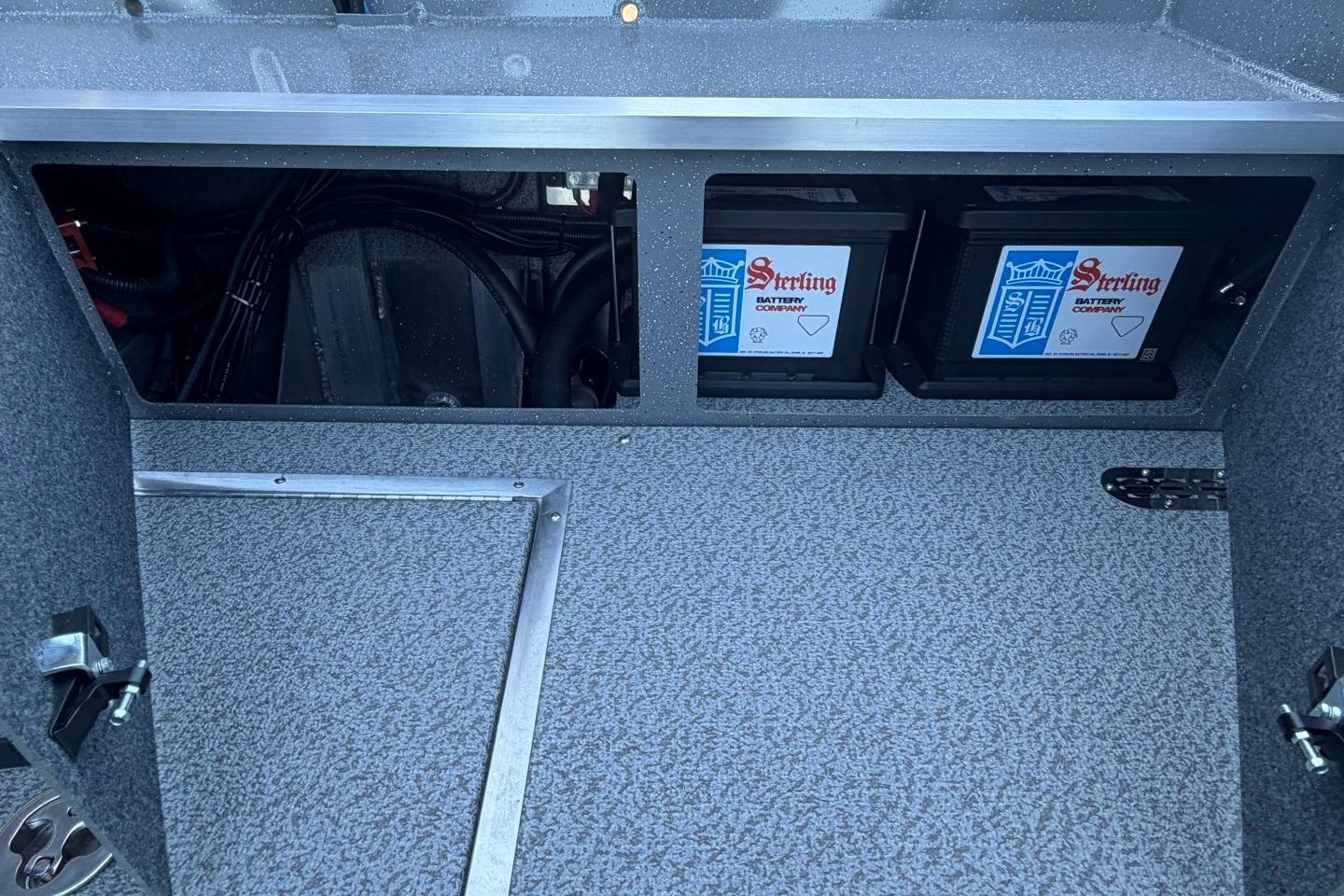 2026 Thunder Jet 209 Rush OT boat battery compartment with Sterling batteries.