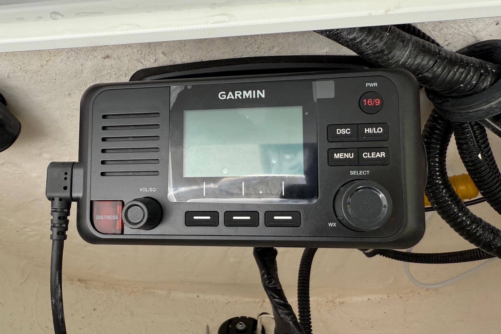 Garmin marine radio on 2026 Sea Hunt Ultra 229 boat dashboard.