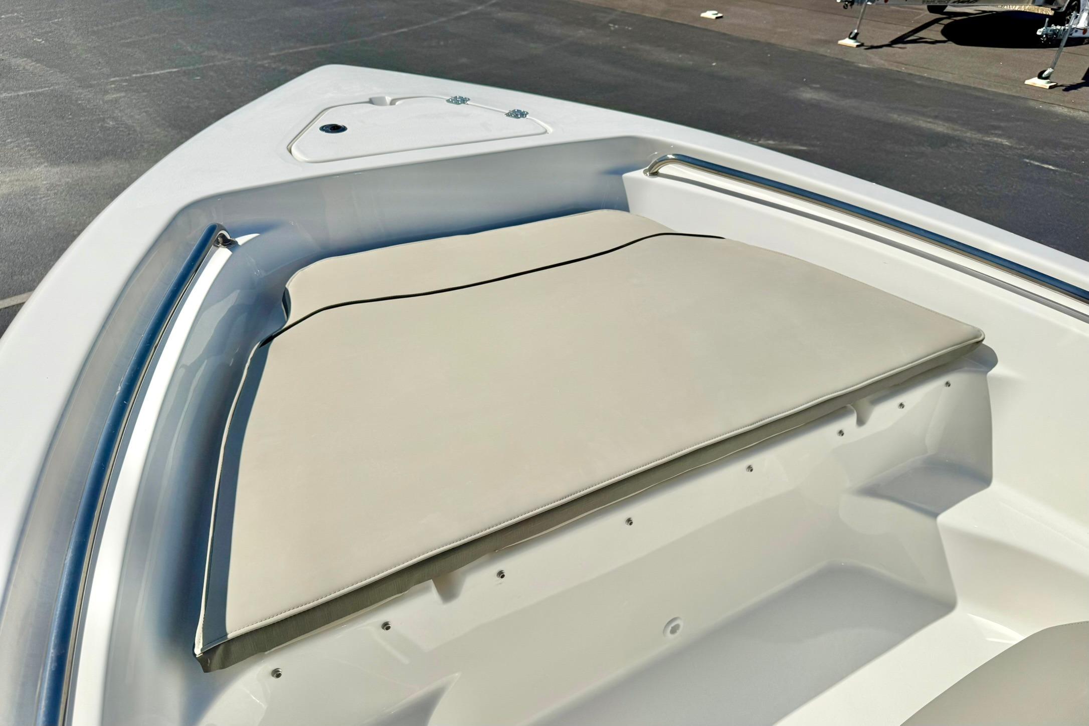 2026 Key West 189 FS boat bow with cushioned seating and sleek design.