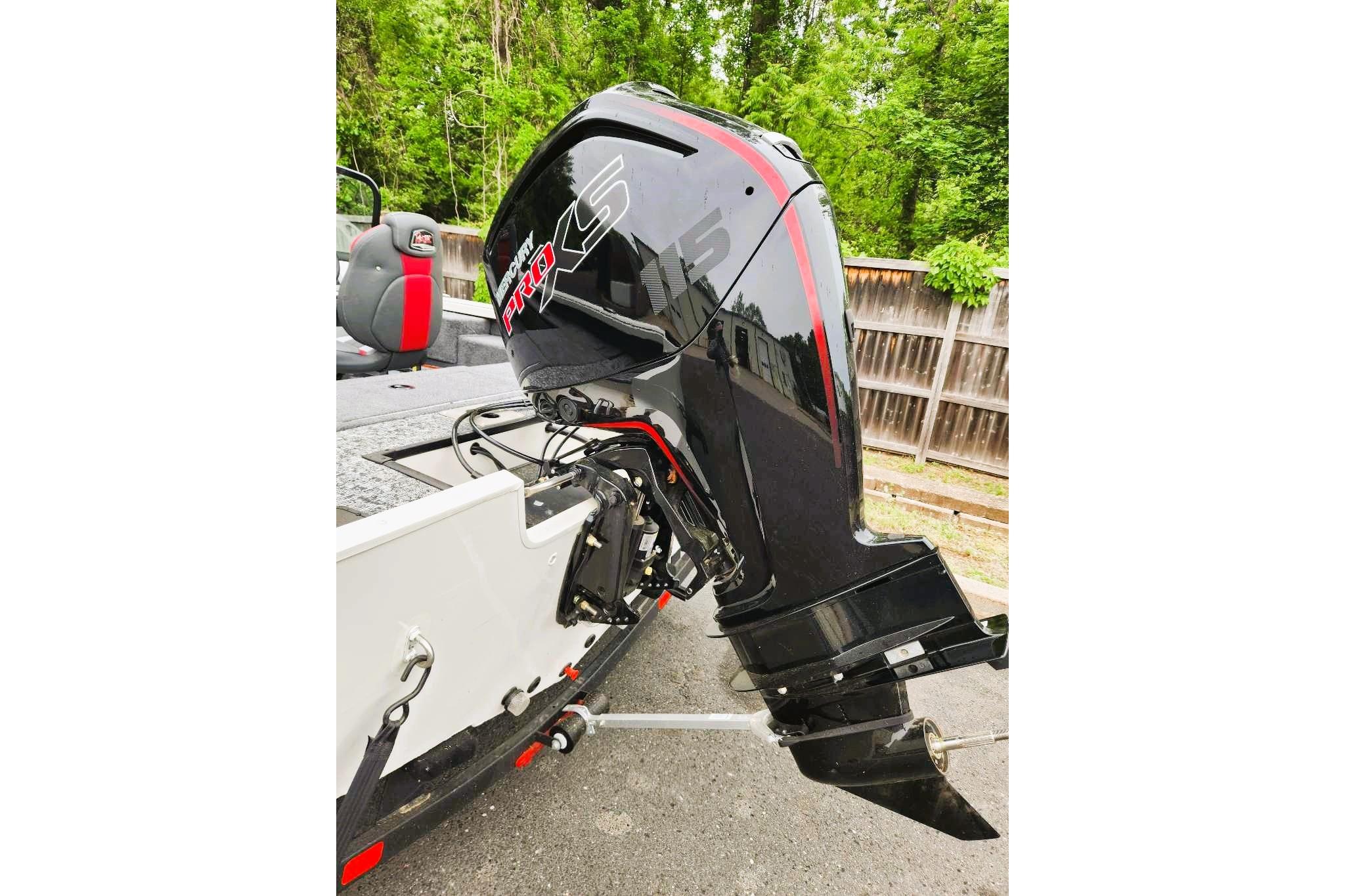 2026 Ranger VS1682SC Reata boat with Mercury Pro XS outboard motor, parked outdoors.
