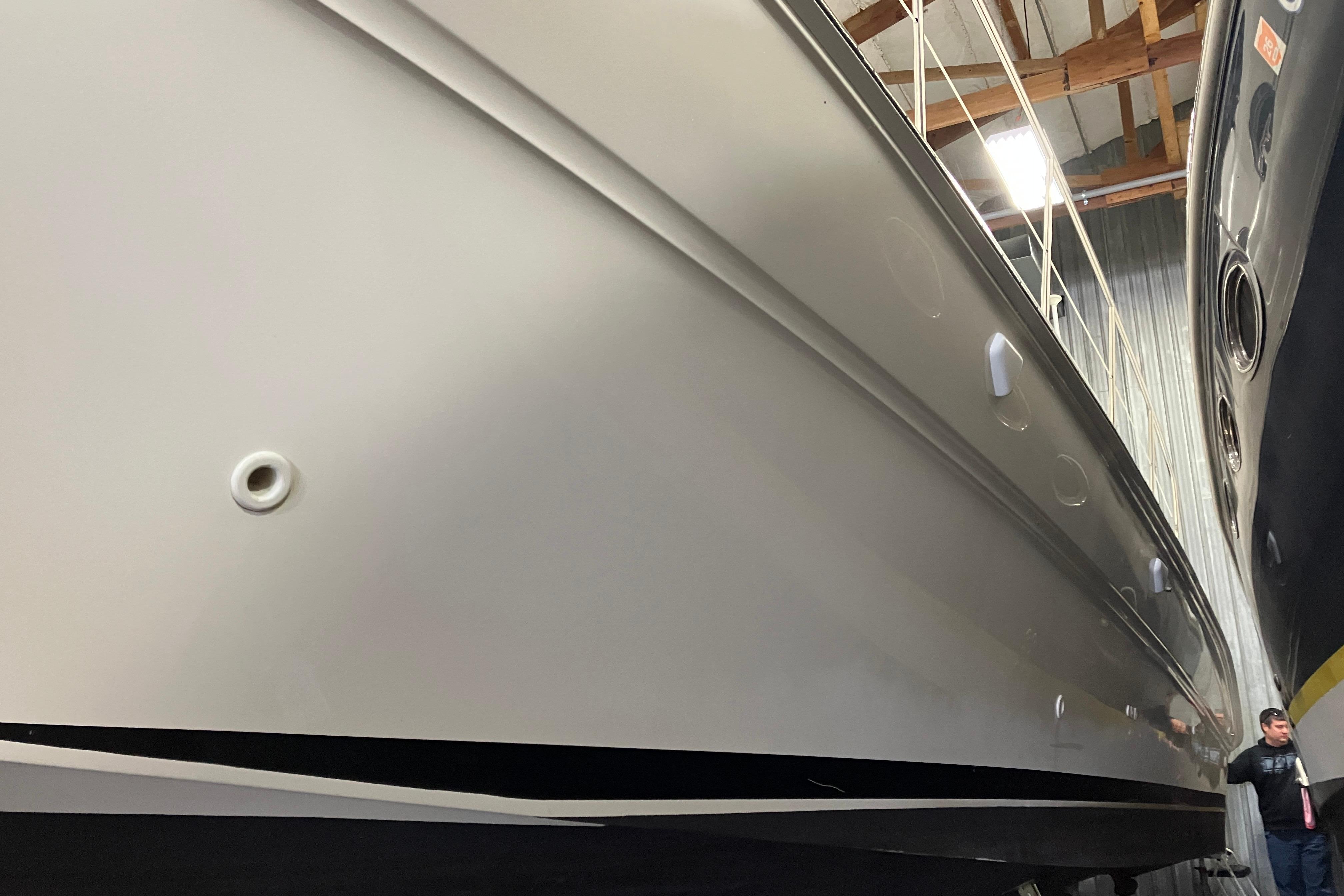 2002 Sea Ray 410 Sundancer yacht in storage, side view.