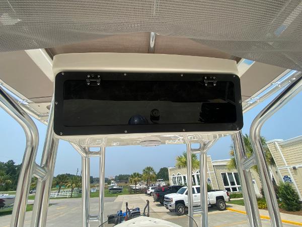2024 Key West 203 FS boat console with overhead storage.