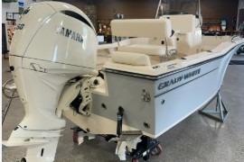 2025 Grady-White Fisherman 180 boat with Yamaha outboard motor in showroom.