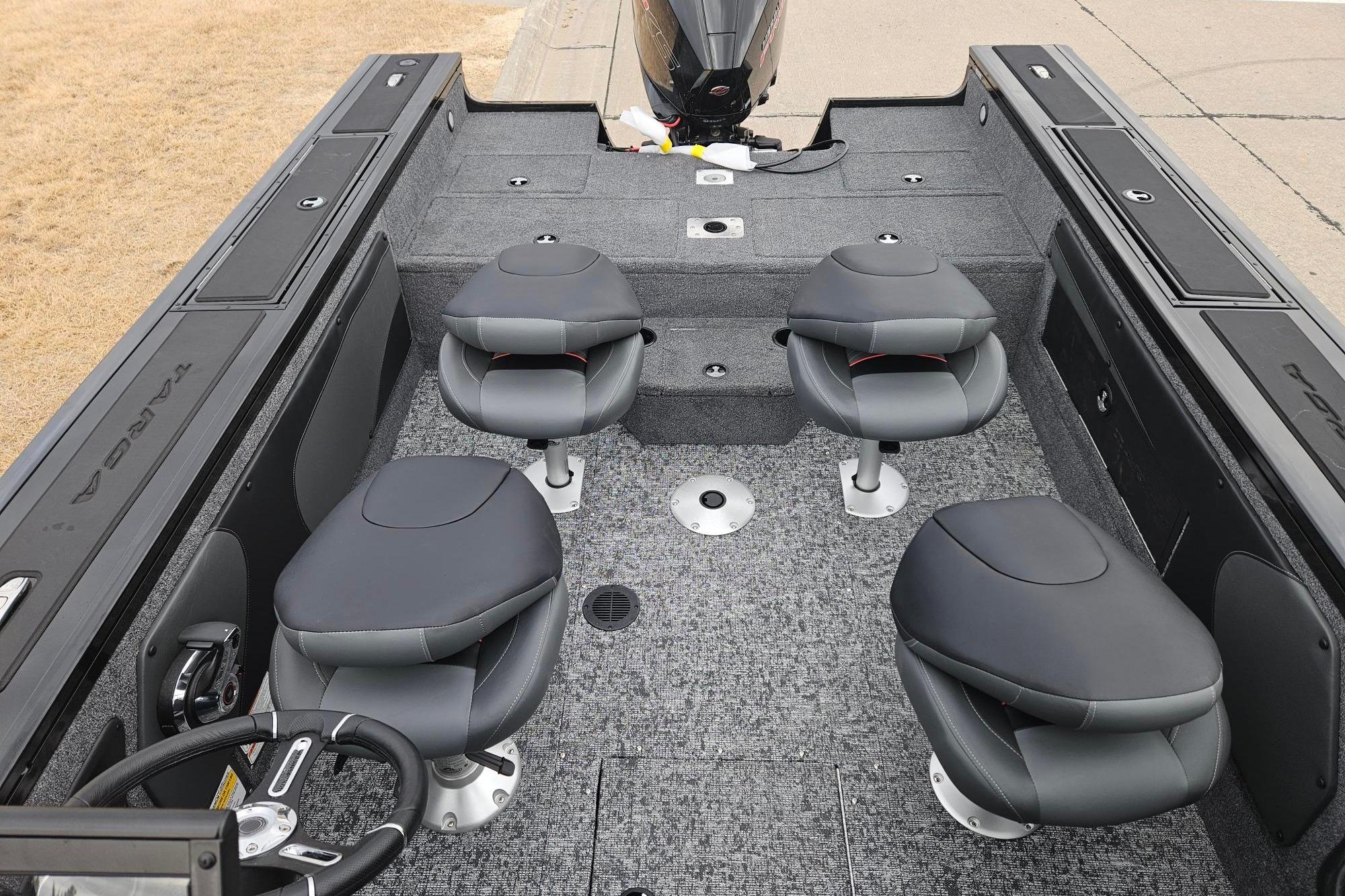 2026 Tracker Targa V-19 WT boat interior with four seats and steering wheel.