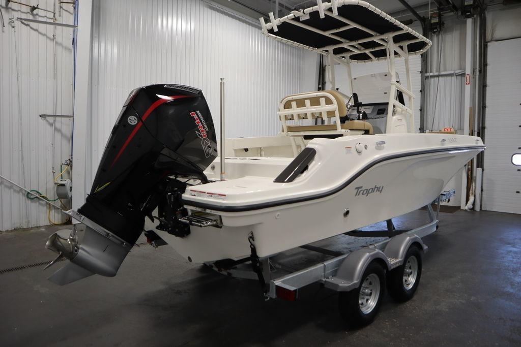 2026 Bayliner Trophy T20CC boat on trailer in indoor storage facility.