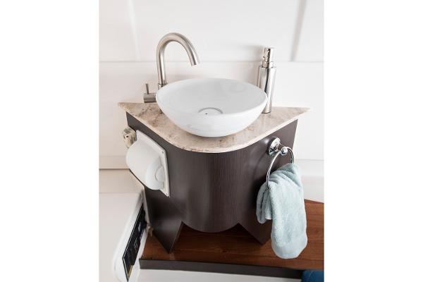 Manufacturer Provided Image: 2023 Pursuit S 328 Sport boat bathroom sink with modern fixtures.