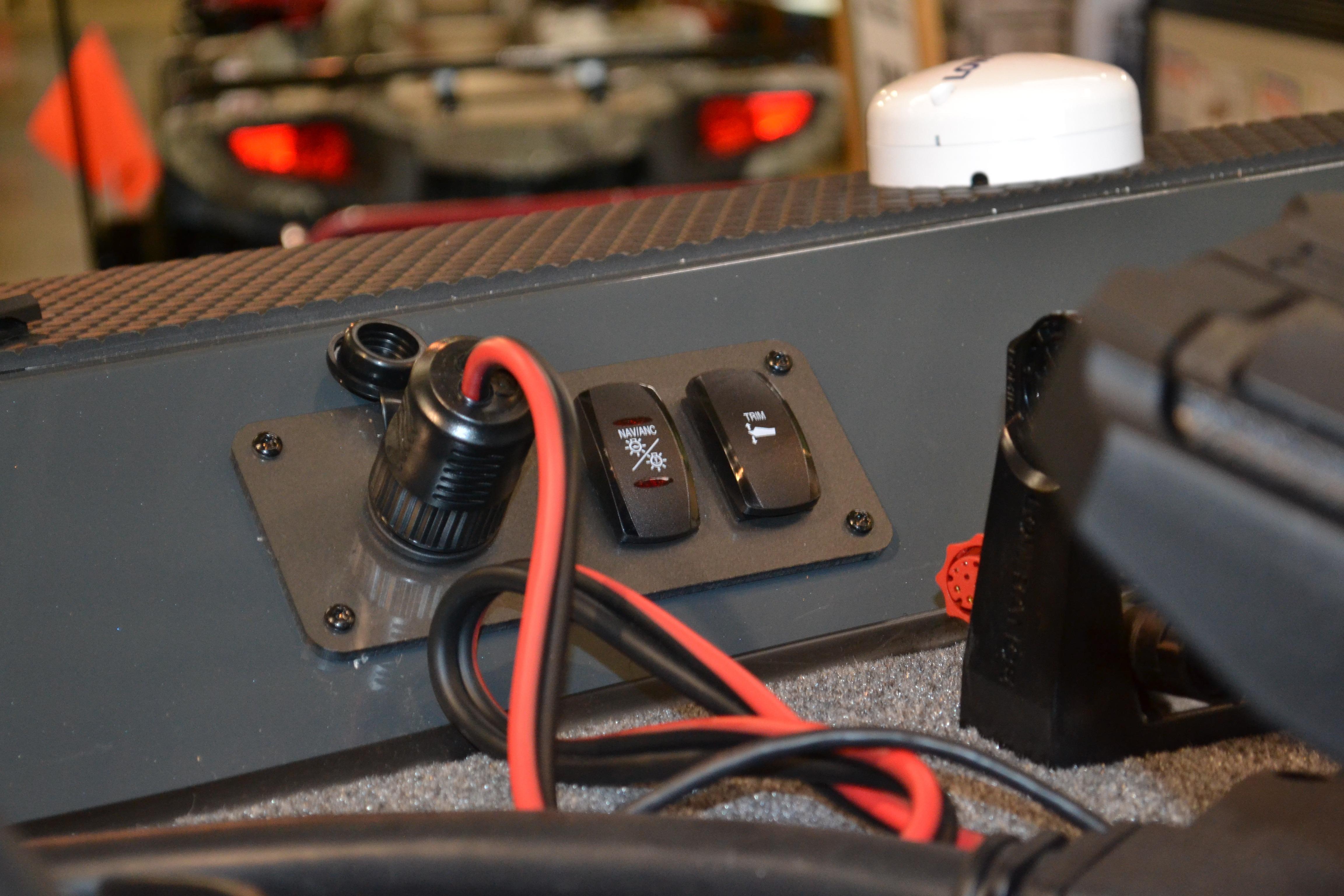 Control panel of 2026 Ranger RT178C boat with switches and wiring.