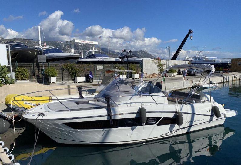 Jeanneau Cap Camarat 9.0 WA 2018 docked on a sunny day.