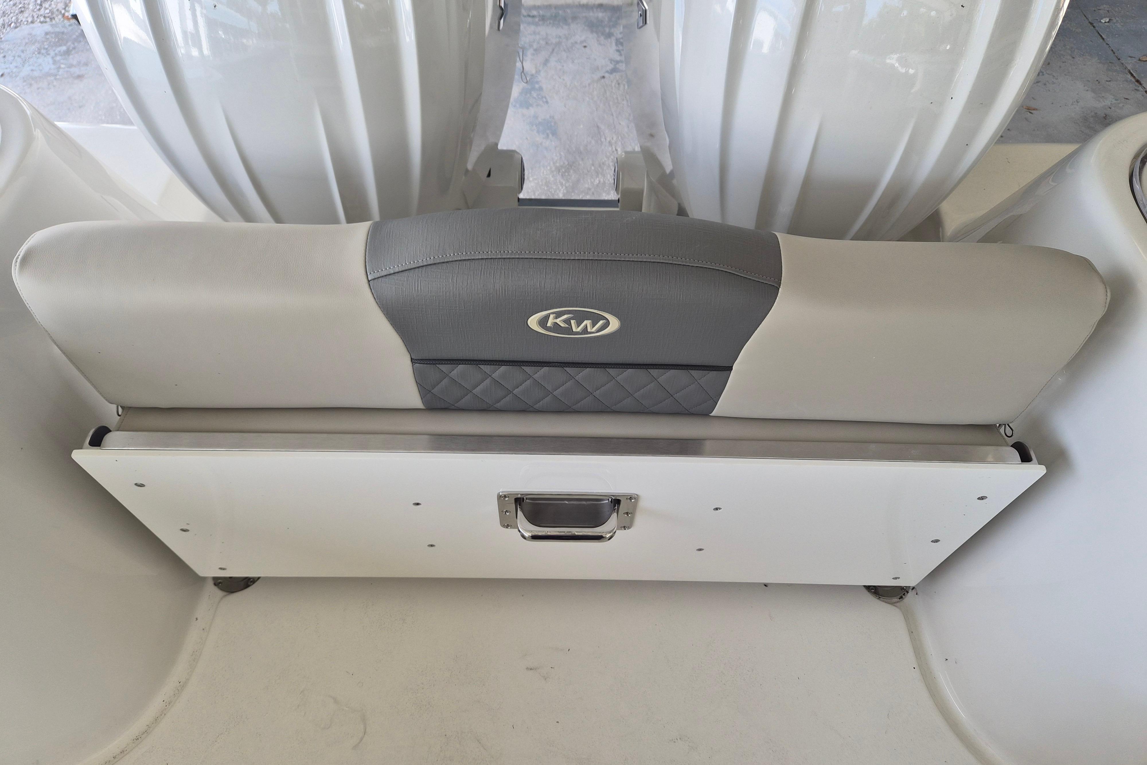 2026 Key West 260 Center Console boat seat with storage compartment.