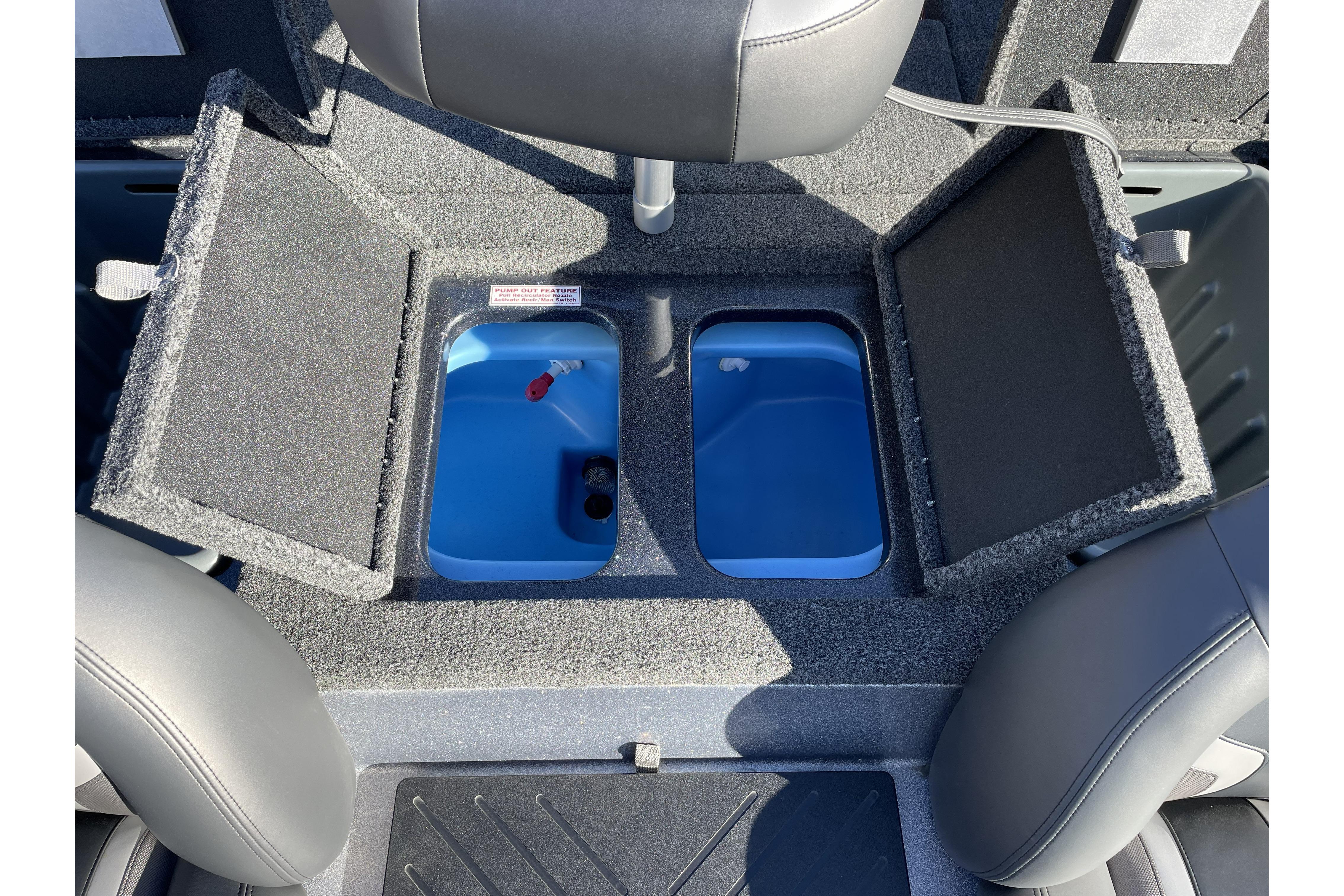 Interior view of 2026 Nitro Z17 boat with open storage compartments.