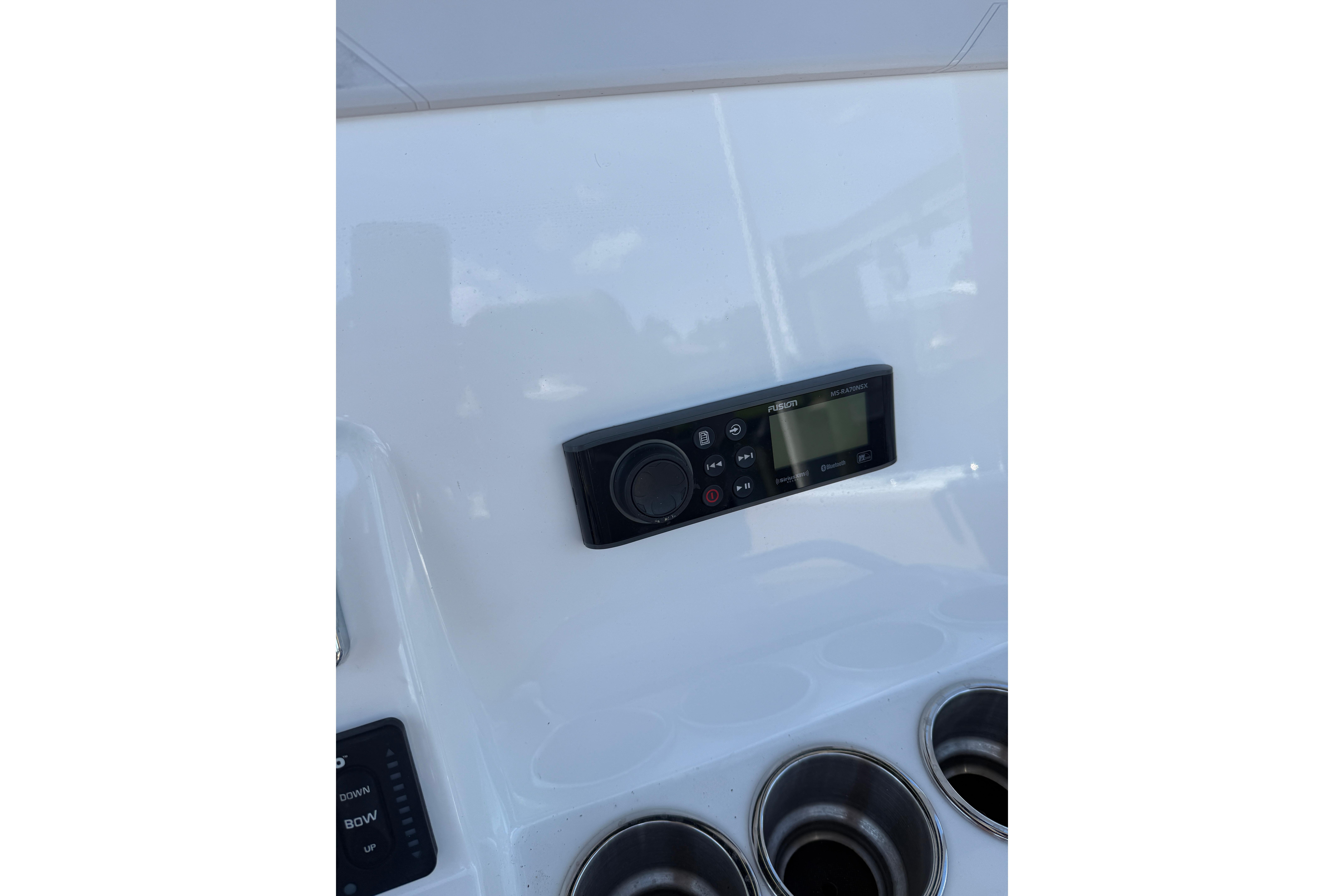 Control panel on 2019 Cape Horn 27XS boat dashboard with cup holders.