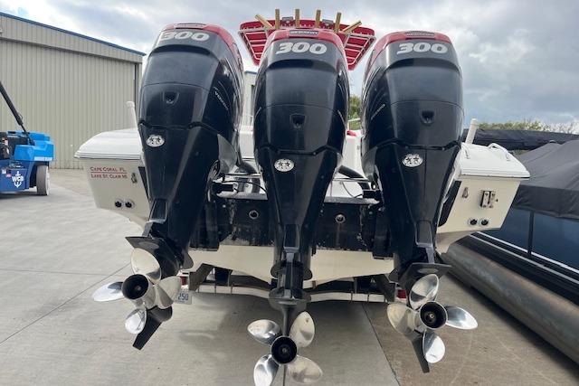 Triple 300 horsepower outboard engines on a 2001 Fountain 38 Center Console boat.