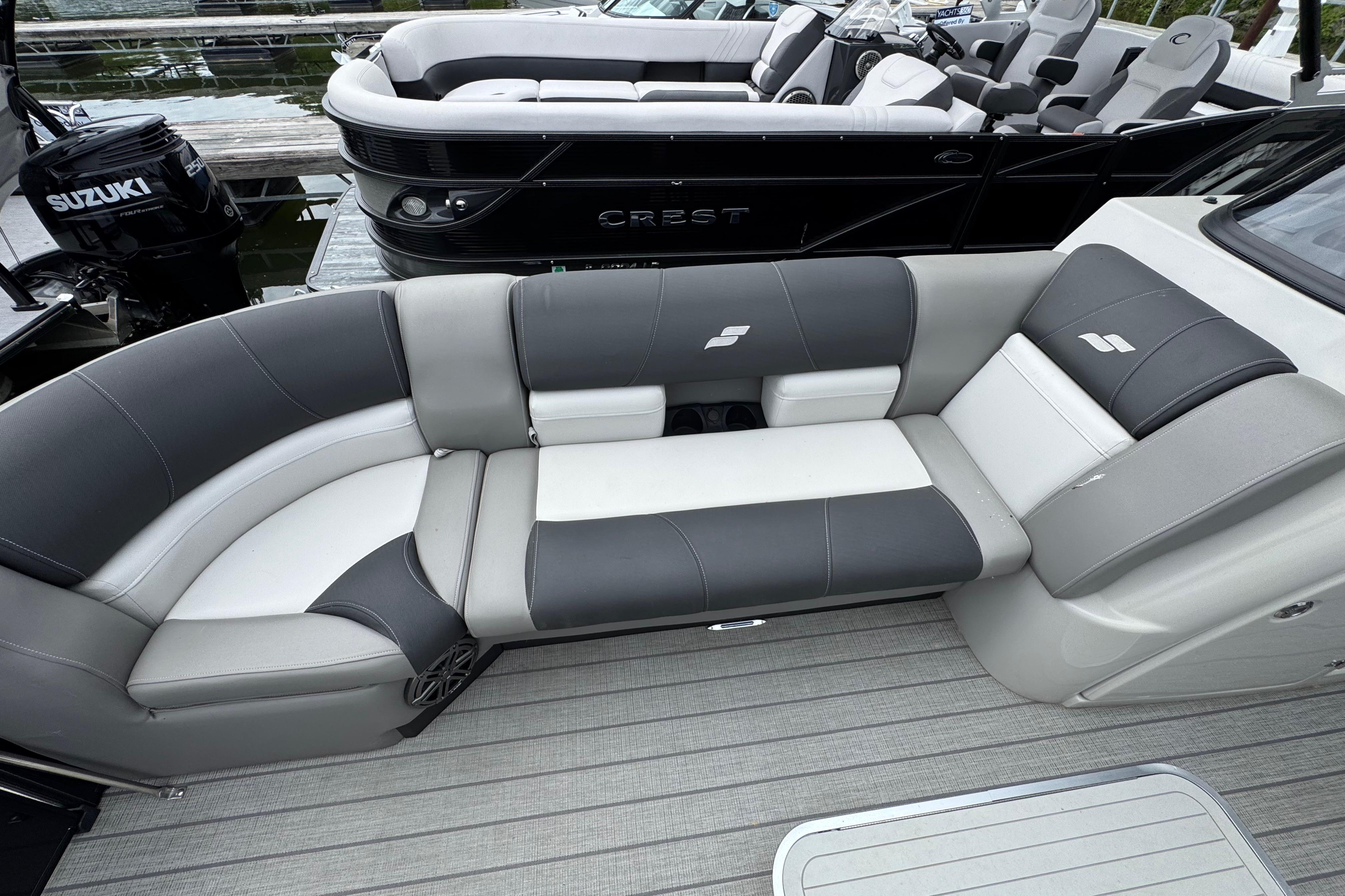 2023 Starcraft MX 25 DL DH boat with sleek gray and white seating.