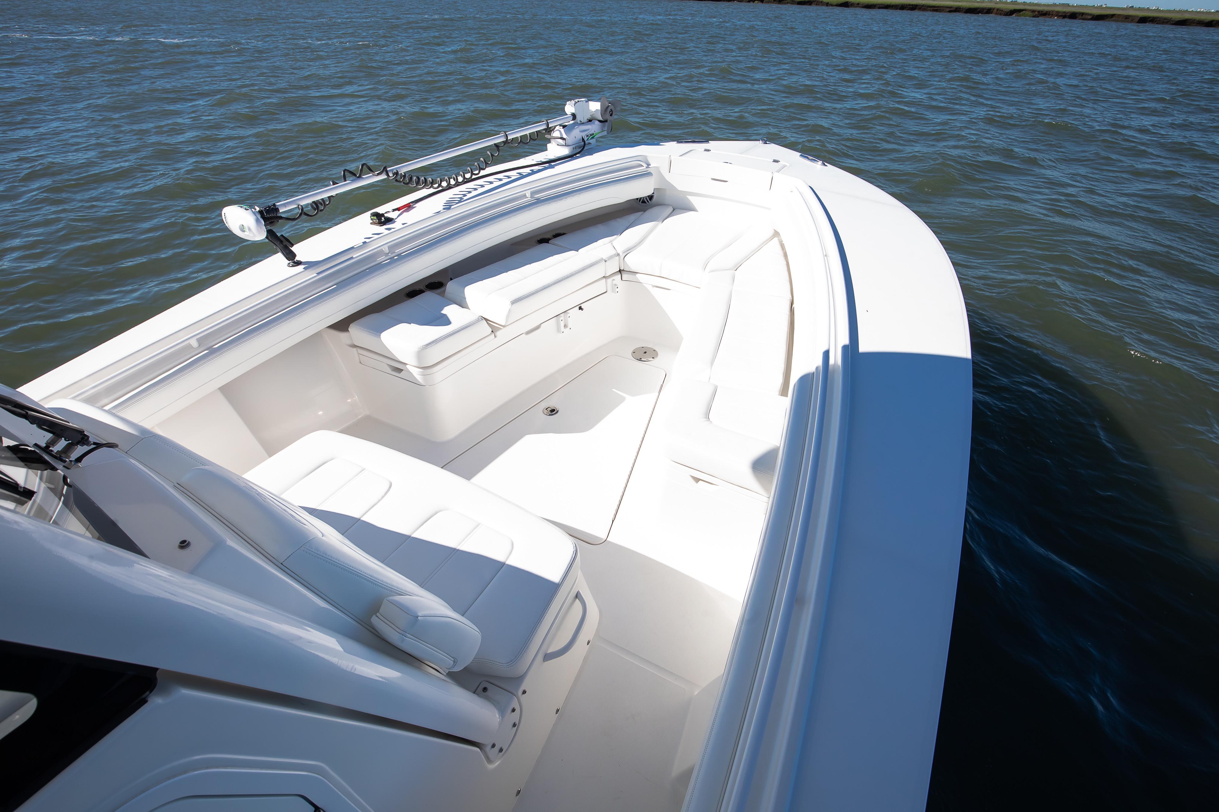 2022 Regulator 28 Forward Seating boat on water, showcasing spacious seating and sleek design.