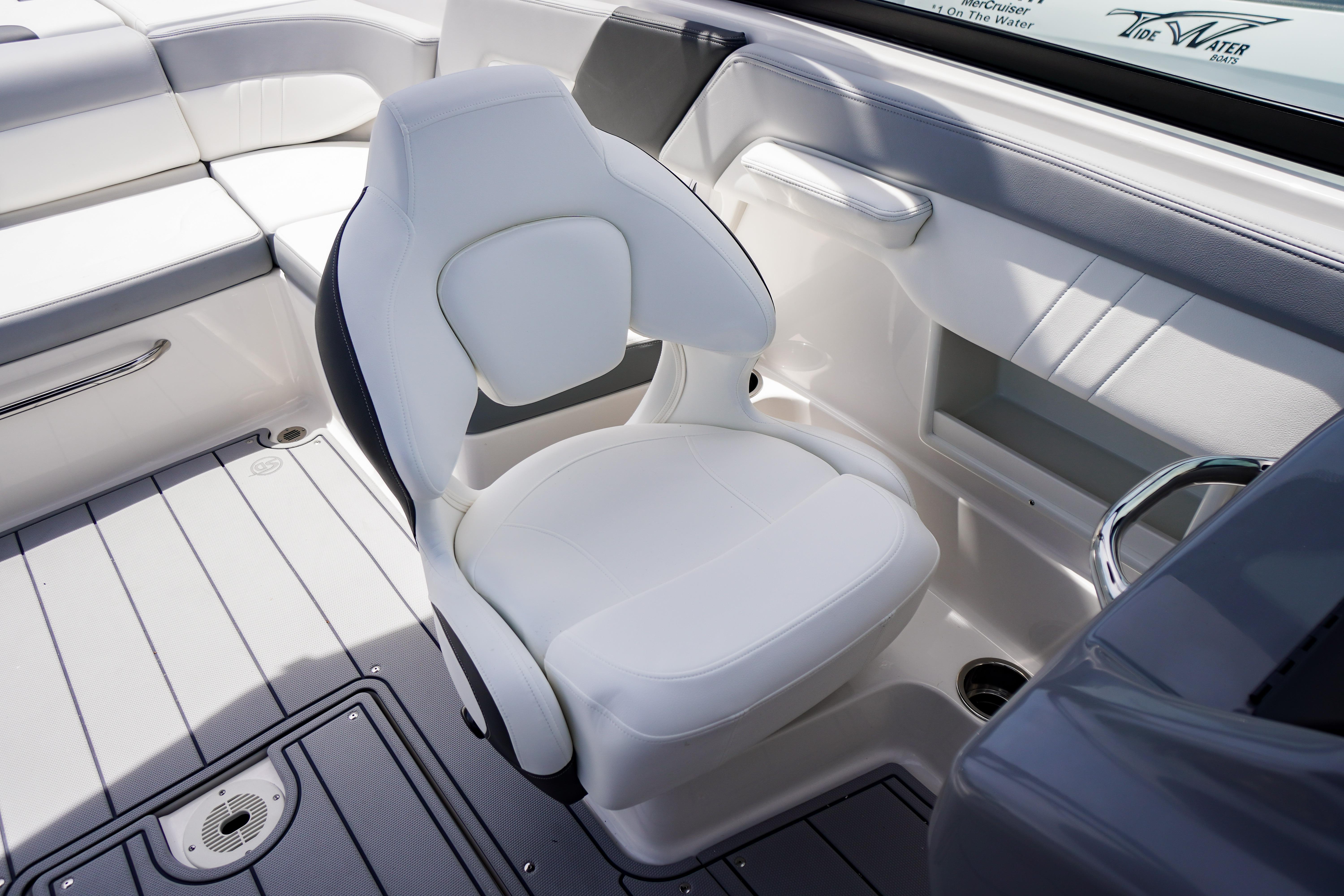 2026 Chaparral 23 SSi OB boat interior with white seating and sleek design.