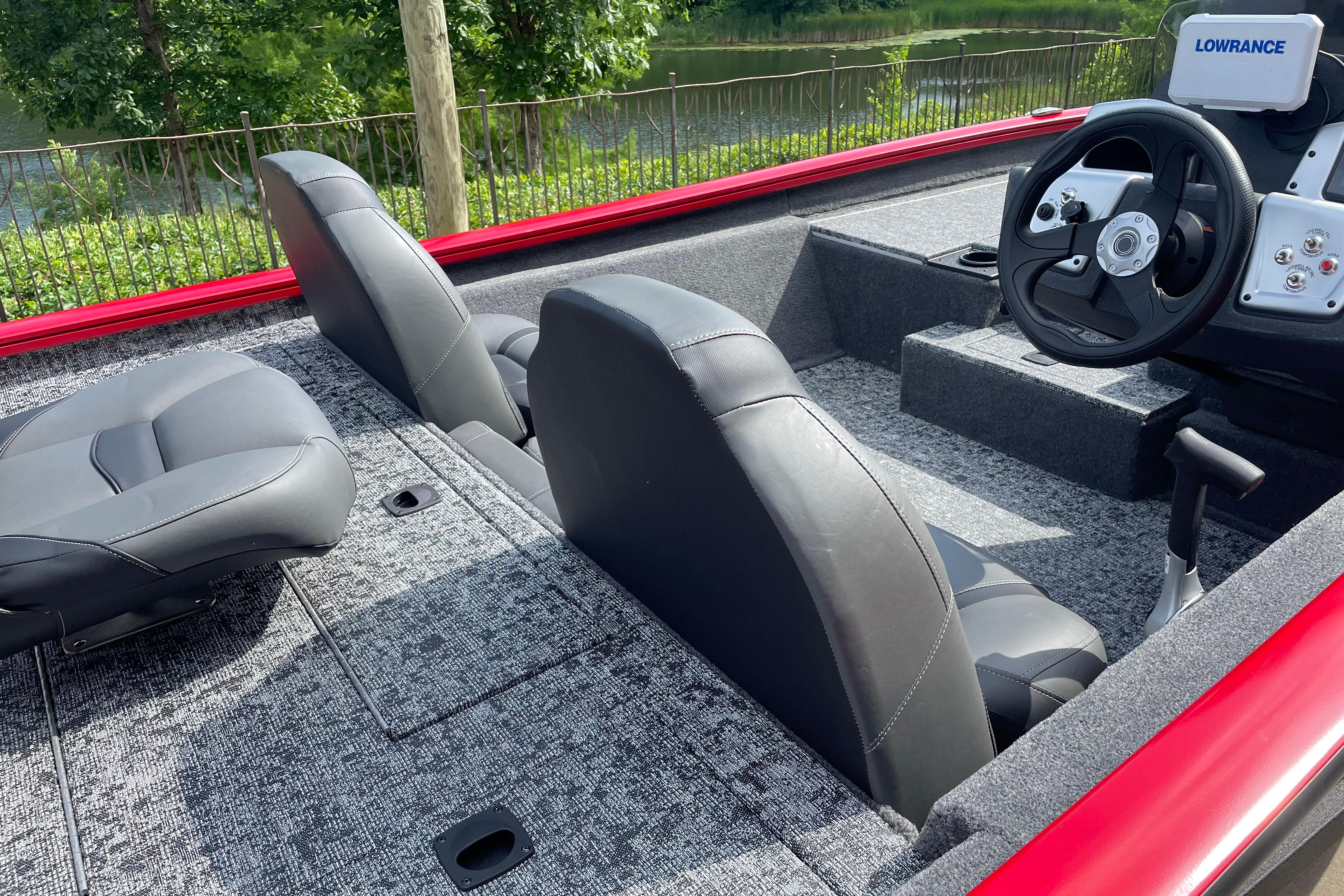 2026 Tracker Pro Team 190 boat interior with steering wheel and seating.