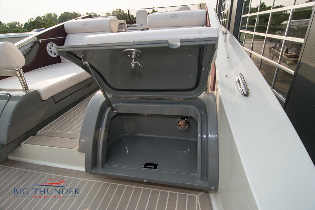 2019 Donzi 41 GT boat storage compartment with open hatch.