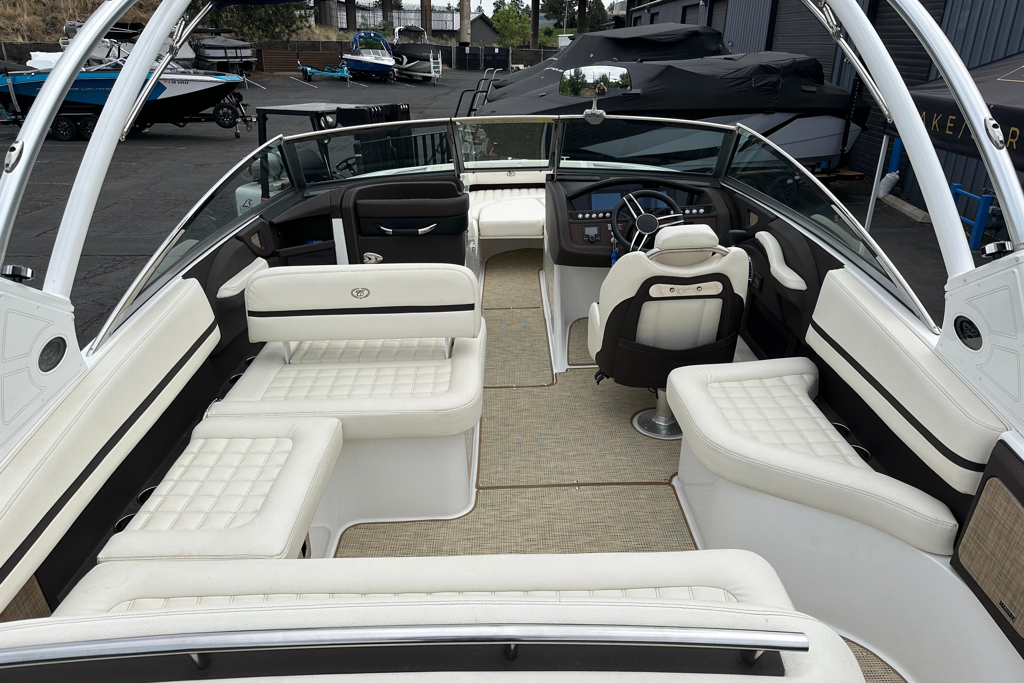 2019 Cobalt R5 boat interior with white seating and modern dashboard.