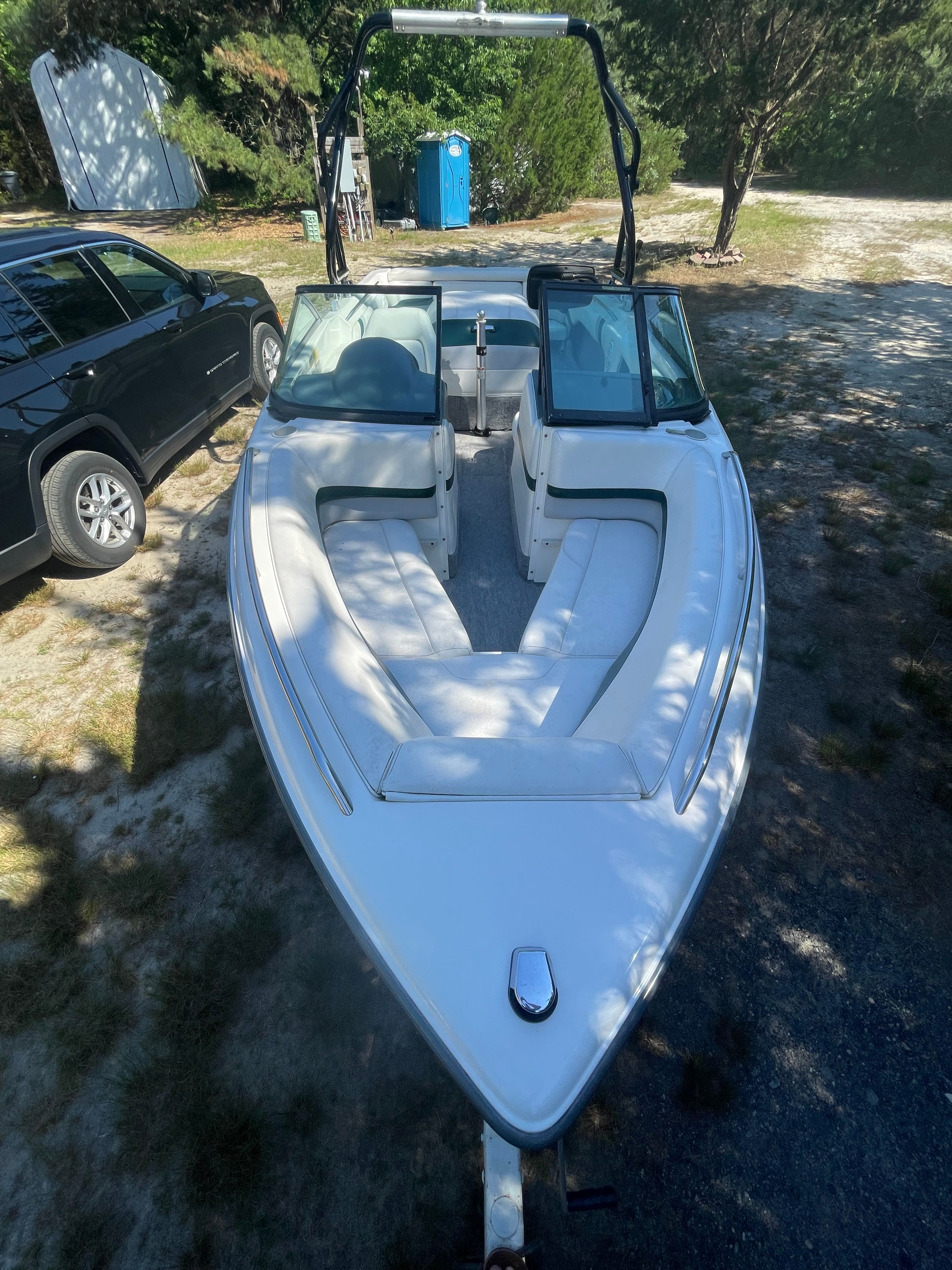 1997 MasterCraft Prostar 205 boat parked on a trailer.