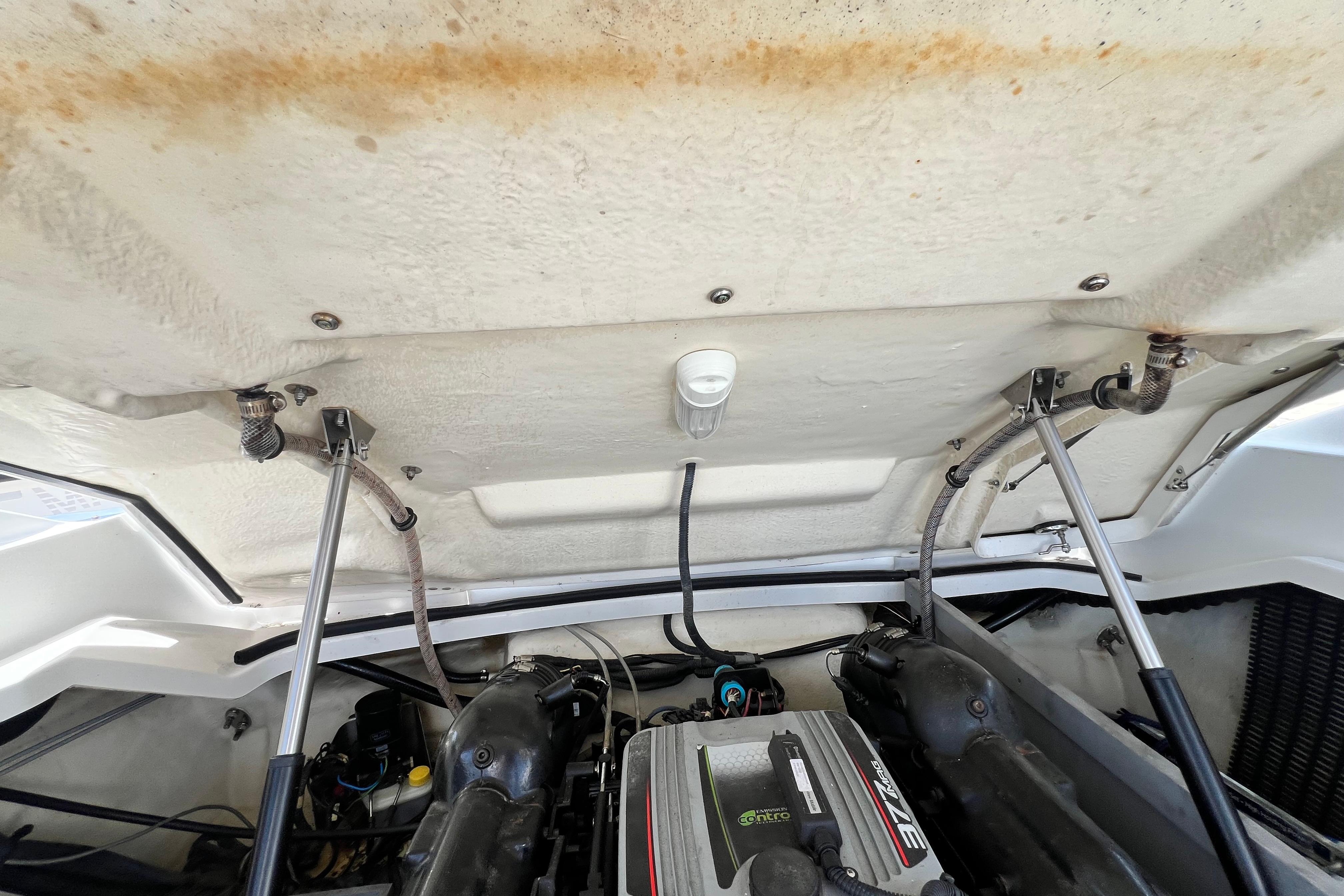 Engine compartment of a 2015 Monterey 268SS Super Sport boat, showing mechanical components.