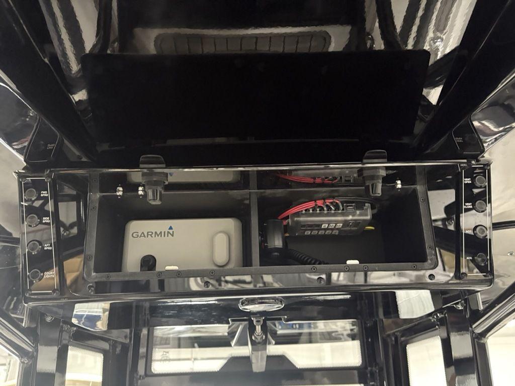 Tidewater 2700 CB 2026 console with Garmin device and control panel.