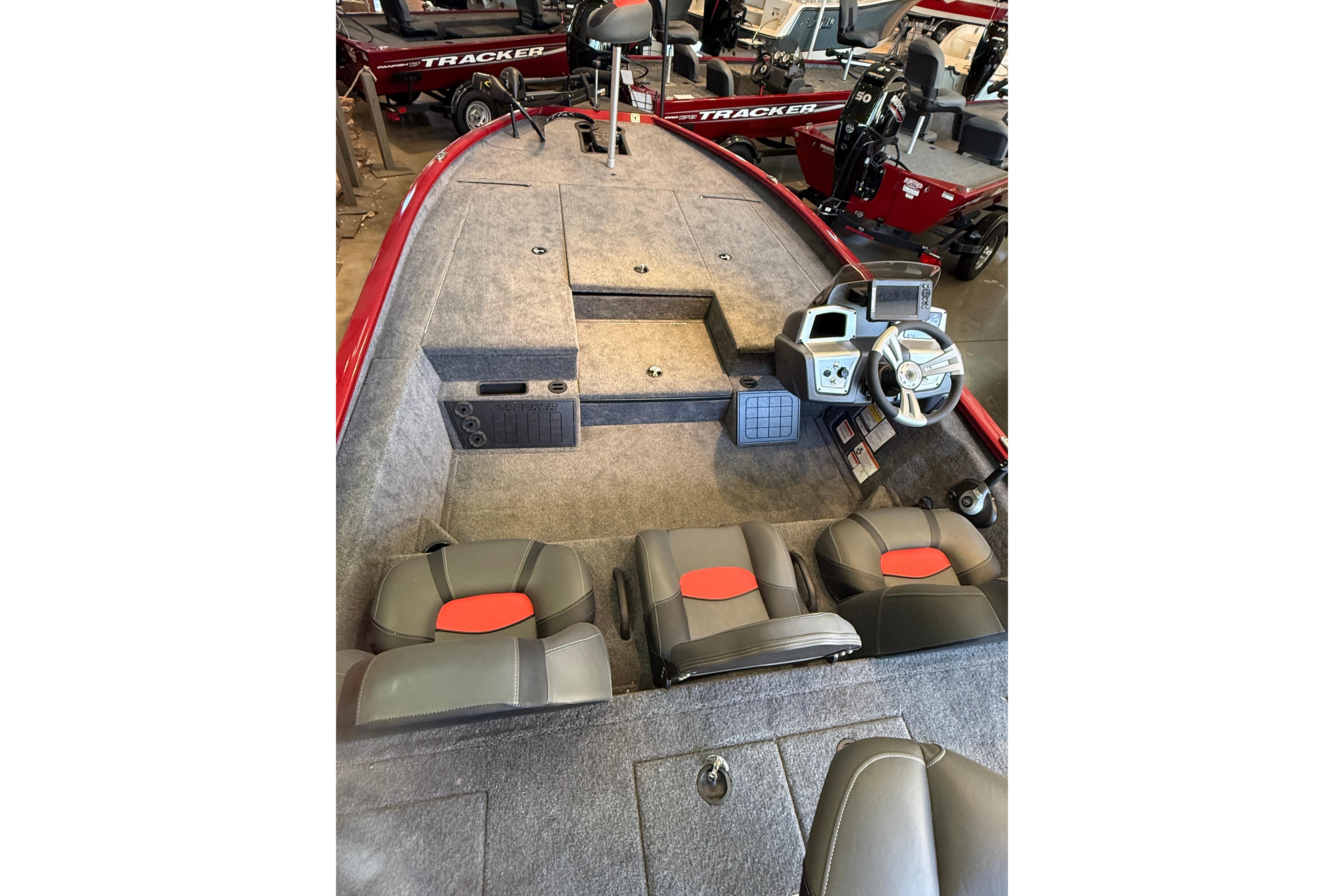 2025 Tracker Savage 215 boat interior with steering console and seating.