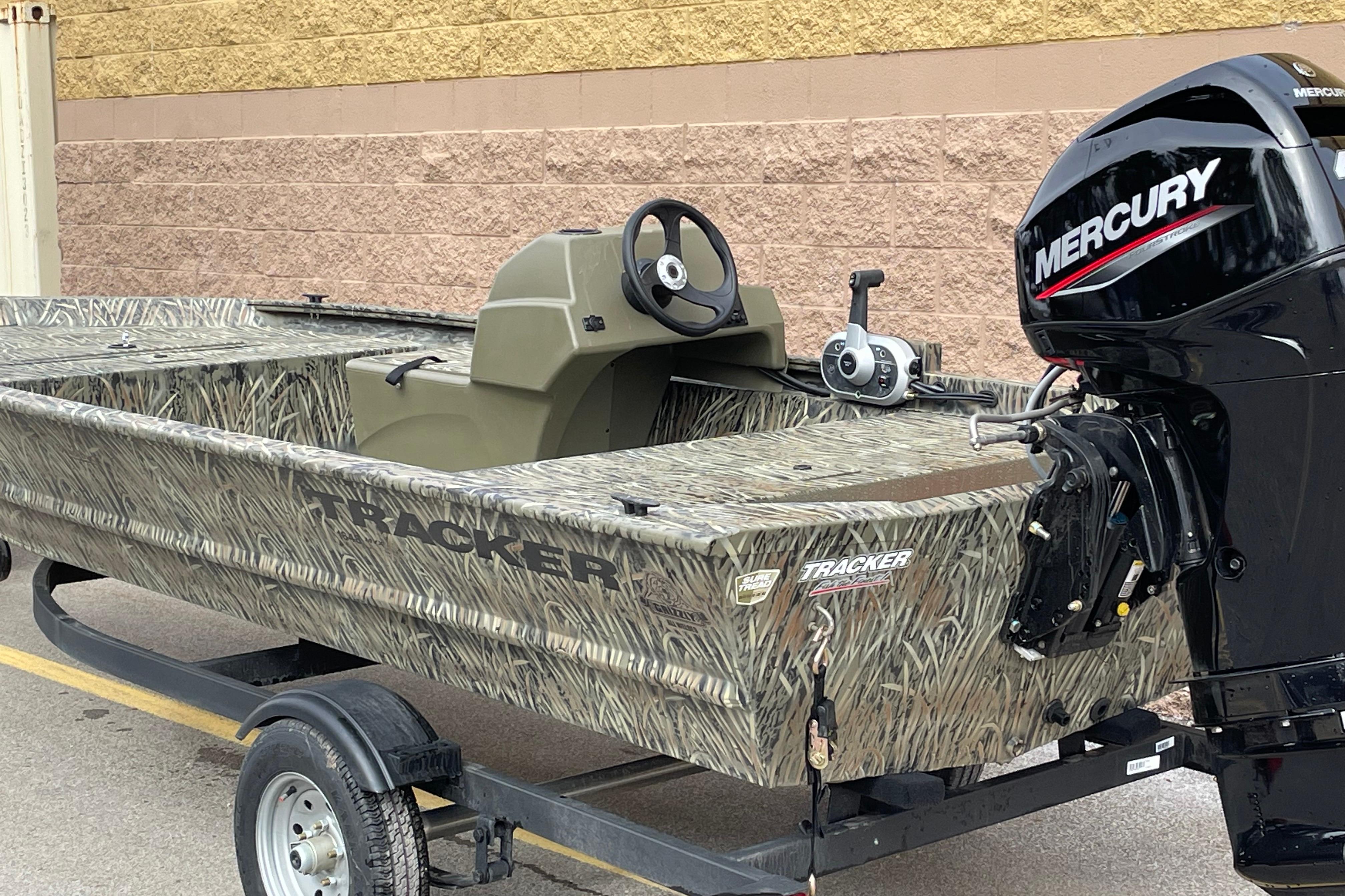 2026 Tracker Grizzly 1648 SC boat with Mercury engine on trailer.