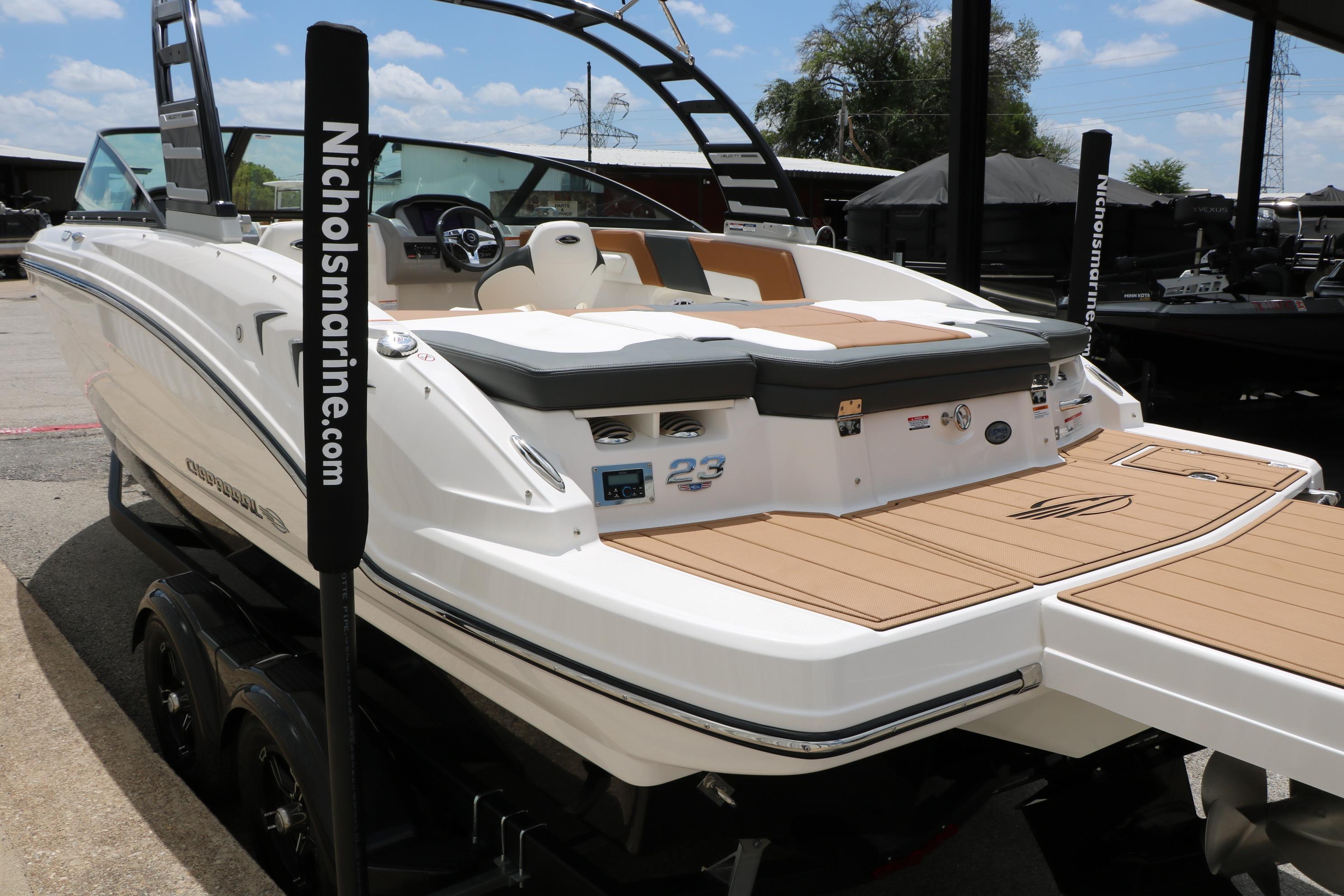 2025 Chaparral 23 SSi boat with sleek design and spacious deck, displayed at Nichols Marine.