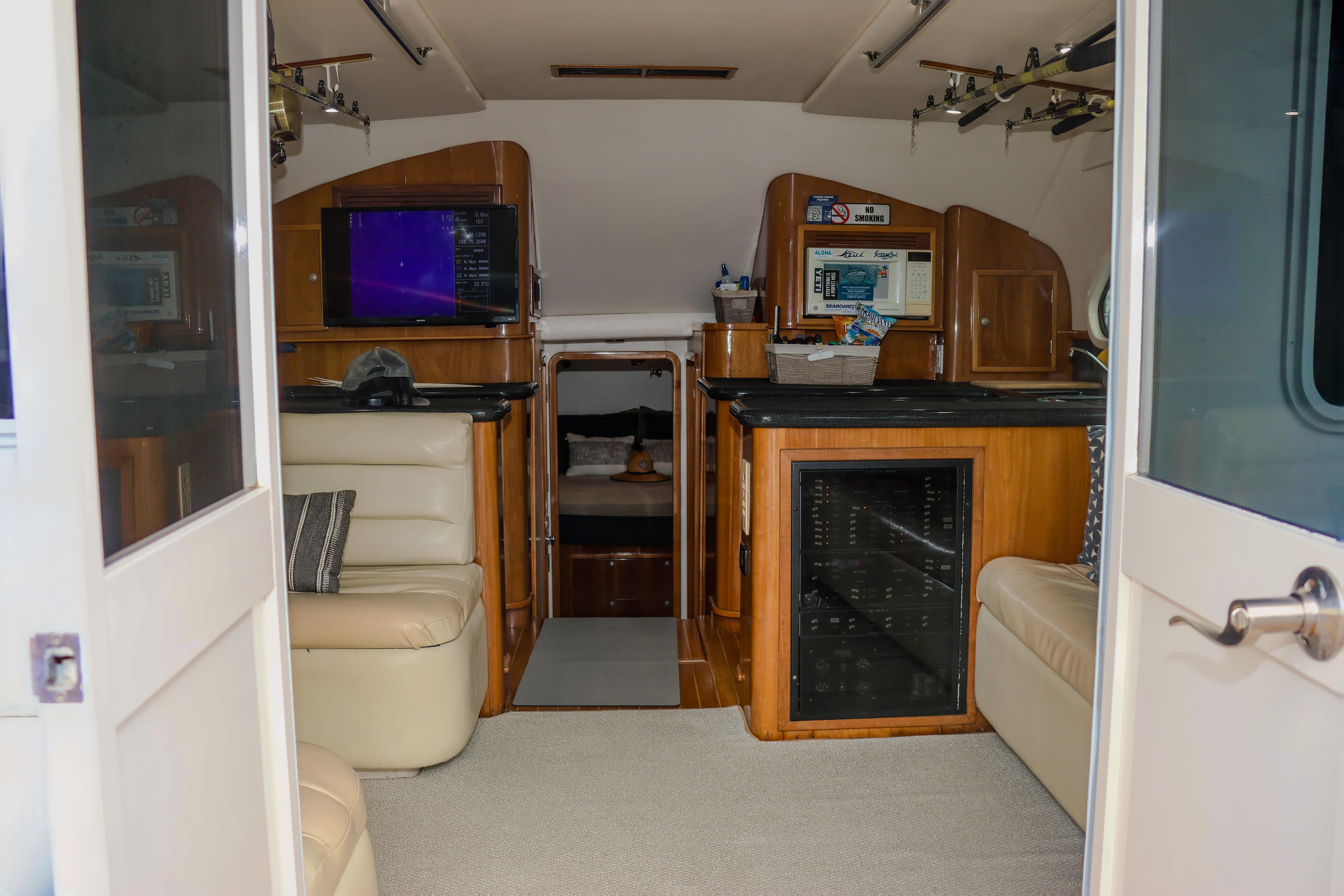 Interior of 2001 Black Watch 40 yacht with leather seating and modern amenities.